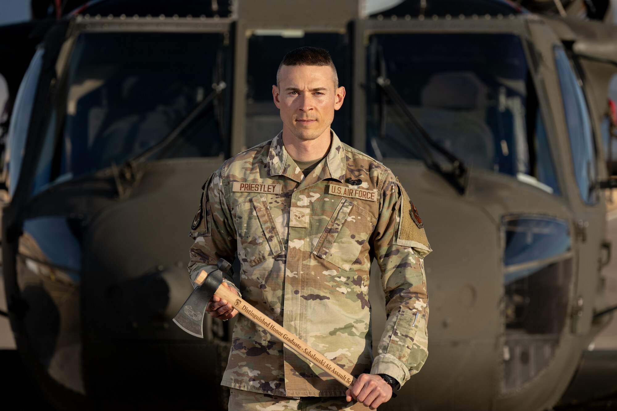 U.S. Air Force Airman 1st Class Ian Priestly, 49th Communication Squadron network technician, poses for a photo at Holloman Air Force Base, New Mexico, Dec. 17, 2024. While at U.S. Army Air Assault School, Priestly was selected as a distinguished graduate, proving his exceptional motivation and attention to detail throughout the course. (U.S. Air Force photo by Senior Airman Antonio Salfran)