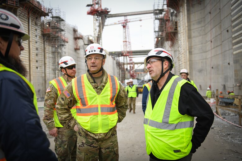 U.S. Army Corps of Engineers, Nashville District team leaders join Lt. Gen. William (Butch) Graham, U.S. Army Corps of Engineers commanding general and 56th Chief of Engineers, for a group photo inside the construction lock chamber during his visit to the Chickamauga Lock on Dec. 19, 2024, along the Tennessee River in Chattanooga, Tennessee.
