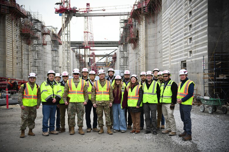 U.S. Army Corps of Engineers, Nashville District team leaders join Lt. Gen. William (Butch) Graham, U.S. Army Corps of Engineers commanding general and 56th Chief of Engineers, for a group photo inside the construction lock chamber during his visit to the Chickamauga Lock on Dec. 19, 2024, along the Tennessee River in Chattanooga, Tennessee.