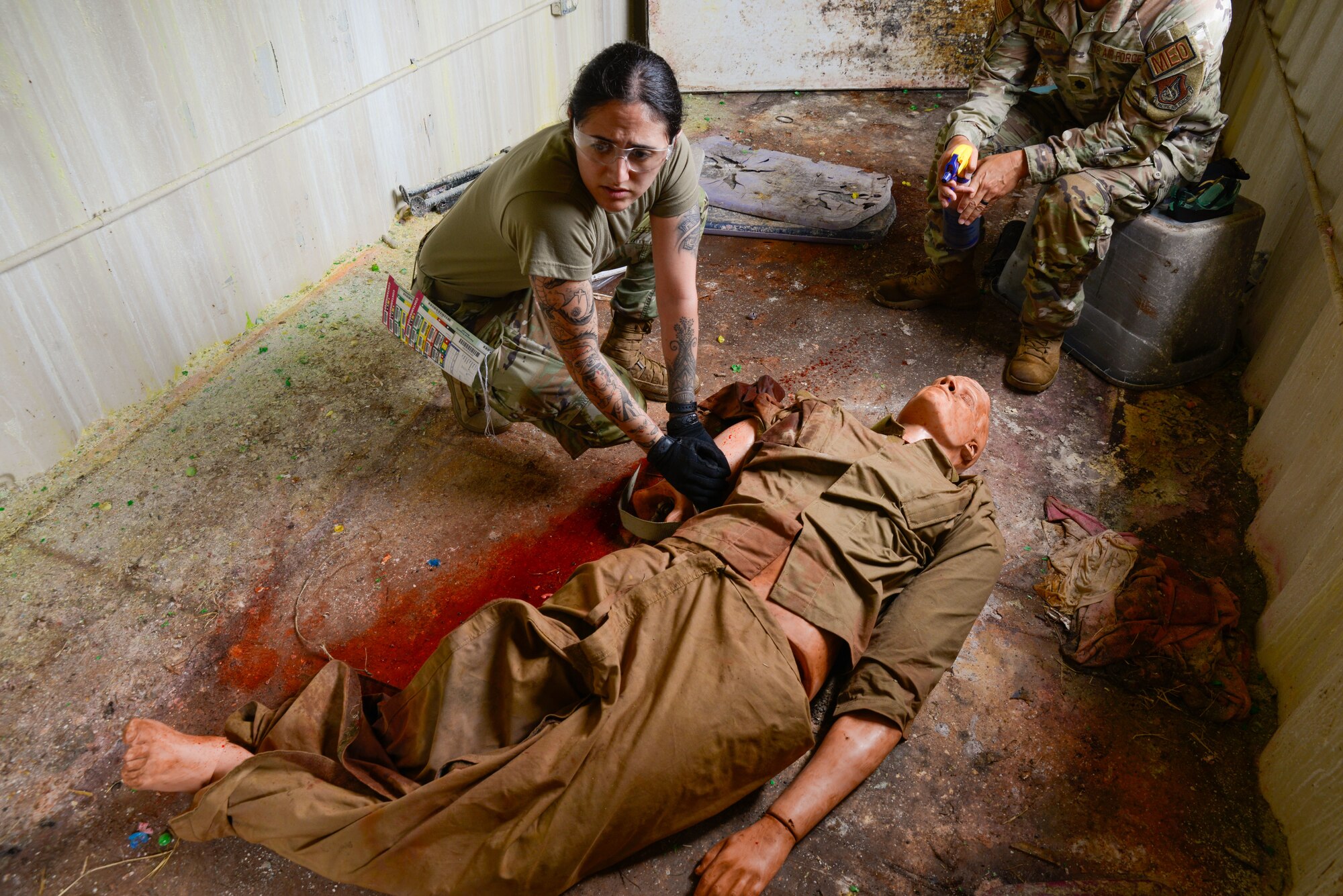 Staff Sgt. Anaiya Vasquez applies pressure to a simulated victim at the Medical Simulation Training Center at Schofield Barracks, Oahu, Hawaii, Aug.