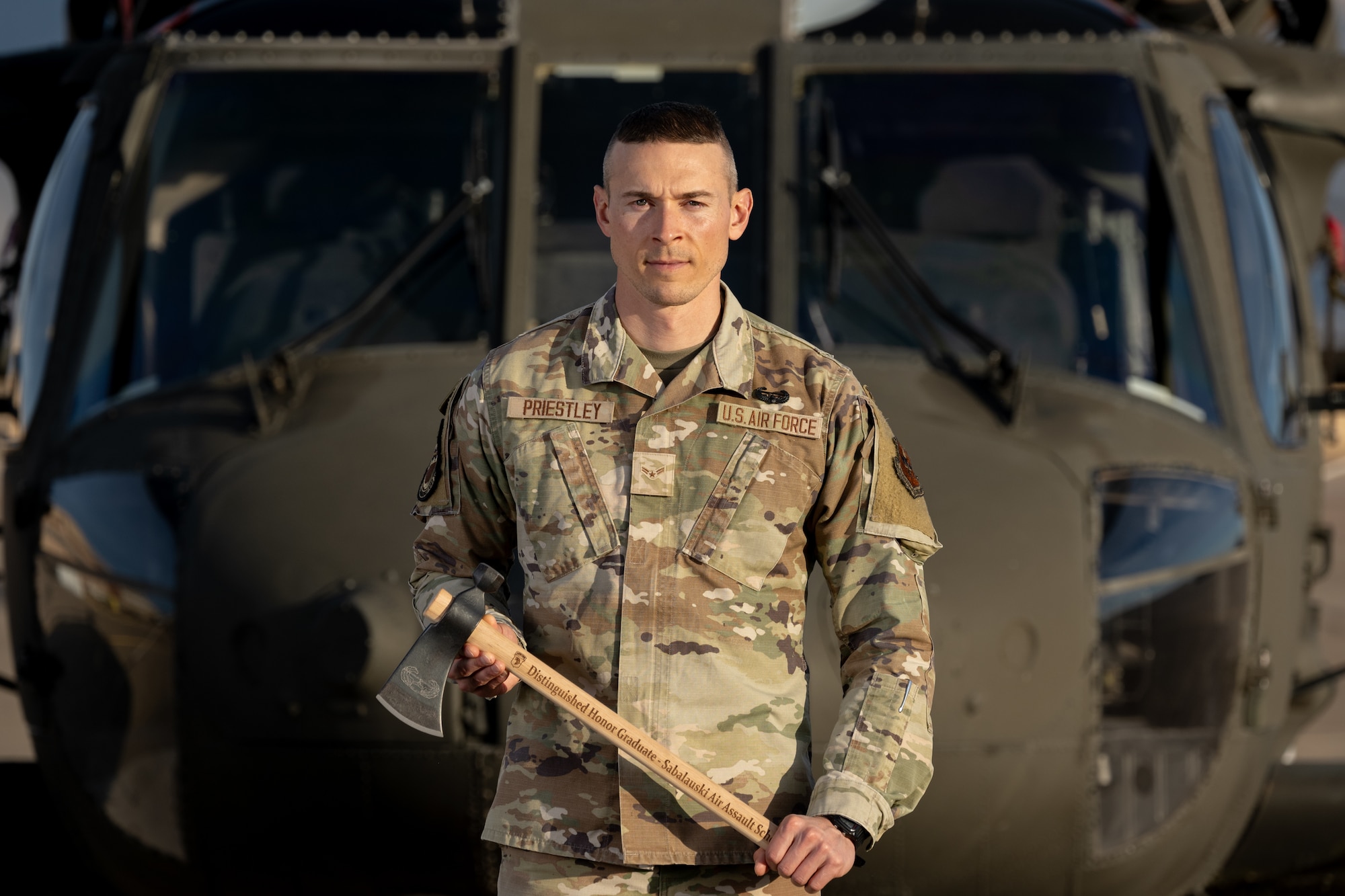 U.S. Air Force Airman 1st Class Ian Priestly, 49th Communication Squadron network technician, poses for a photo at Holloman Air Force Base, New Mexico, Dec. 17, 2024. While at U.S. Army Air Assault School, Priestly was selected as a distinguished graduate, proving his exceptional motivation and attention to detail throughout the course. (U.S. Air Force photo by Senior Airman Antonio Salfran)