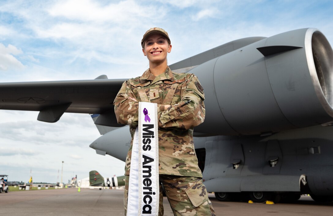 Second Lieutenant Madison Marsh poses by a C-17 f