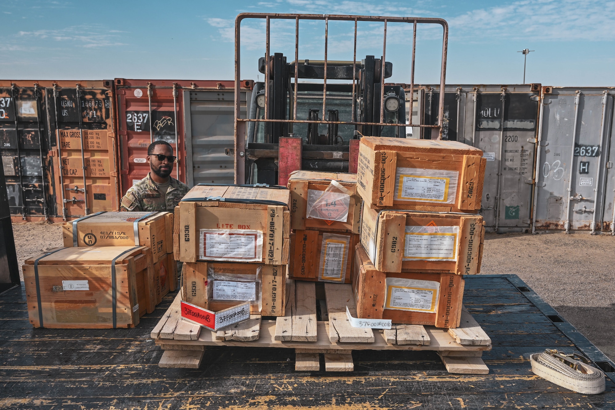 A group of boxes stand on a forklift