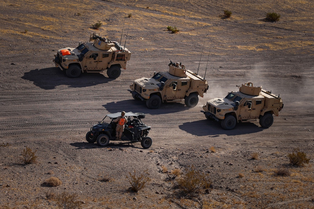 Marines execute motorized fire and movement training during an adversarial force exercise on Noble’s Pass at Marine Corps Air-Ground Combat Center Twentynine Palms, Calif., Dec. 4, 2024.