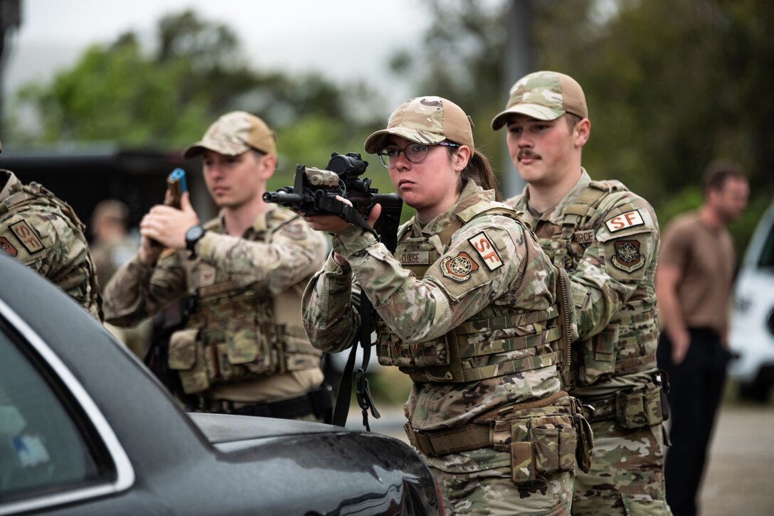 Members of the Kentucky Air National Guard’s 123rd Security Forces Squadron demonstrate vehicle interdiction techniques at Camp San Luis Obispo, Calif., May 17, 2024, as part of an information exchange between 27 Kentucky Guard Airmen and six Ecuadorian special forces Airmen. The event, which focused on providing military assistance to civilian law enforcement, was held under the auspices of the National Guard Bureau’s State Partnership Program, which pairs foreign military allies with National Guard units across the United States for mutual exchange of information and cooperation over a broad range of civil and military affairs. (U.S. Air National Guard photo by Tech. Sgt. Chloe Ochs)