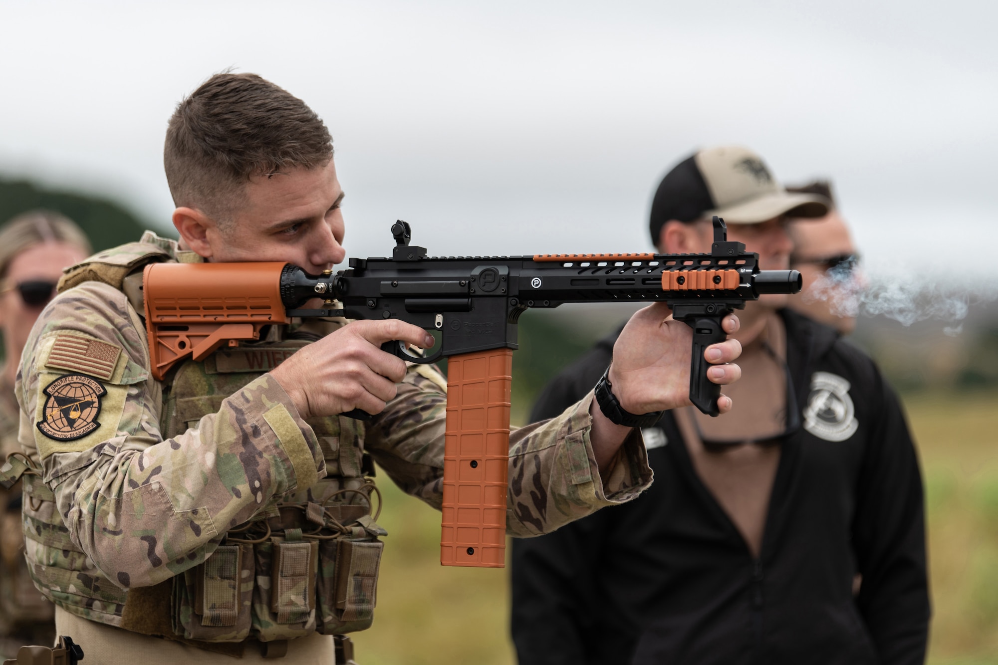 A member of the Kentucky Air National Guard’s 123rd Security Forces Squadron fires his service rifle at Camp San Luis Obispo, Calif., May 16, 2024, as part of an information exchange between 27 Kentucky Guard Airmen and six Ecuadorian special forces Airmen. The event, which focused on providing military assistance to civilian law enforcement, was held under the auspices of the National Guard Bureau’s State Partnership Program, which pairs foreign military allies with National Guard units across the United States for mutual exchange of information and cooperation over a broad range of civil and military affairs. (U.S. Air National Guard photo by Tech. Sgt. Chloe Ochs)