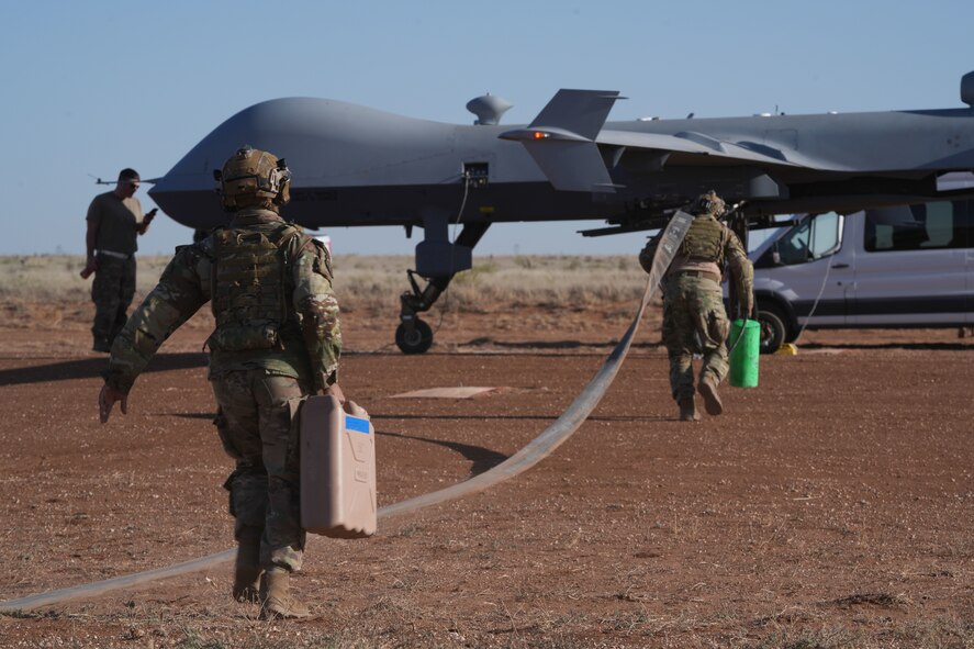 Airmen refuel an MQ-9 Reaper