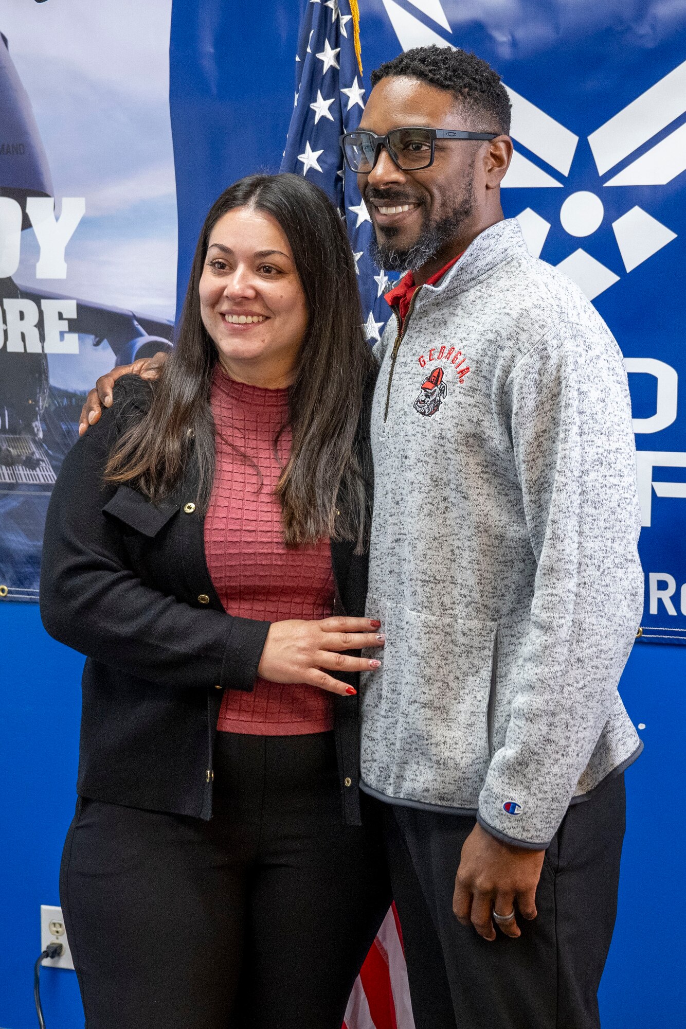 Trakeius Battle, a new recruit in the Air Force Reserve, poses with his wife, Luisa, after taking the Oath of Enlistment at the Duluth, Georgia, recruiting office.