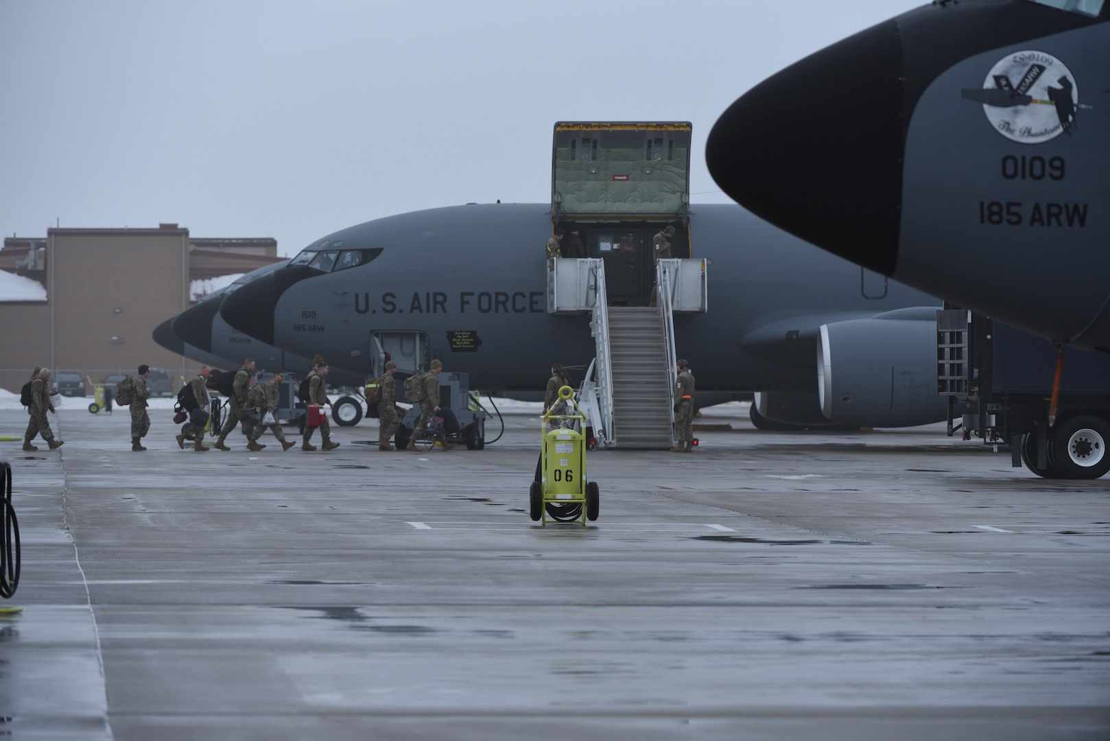 Members of the Iowa Air National Guard’s 185th Air Refueling Wing depart Sioux City, Iowa, for Andersen Air Force base on Jan. 24, 2024.