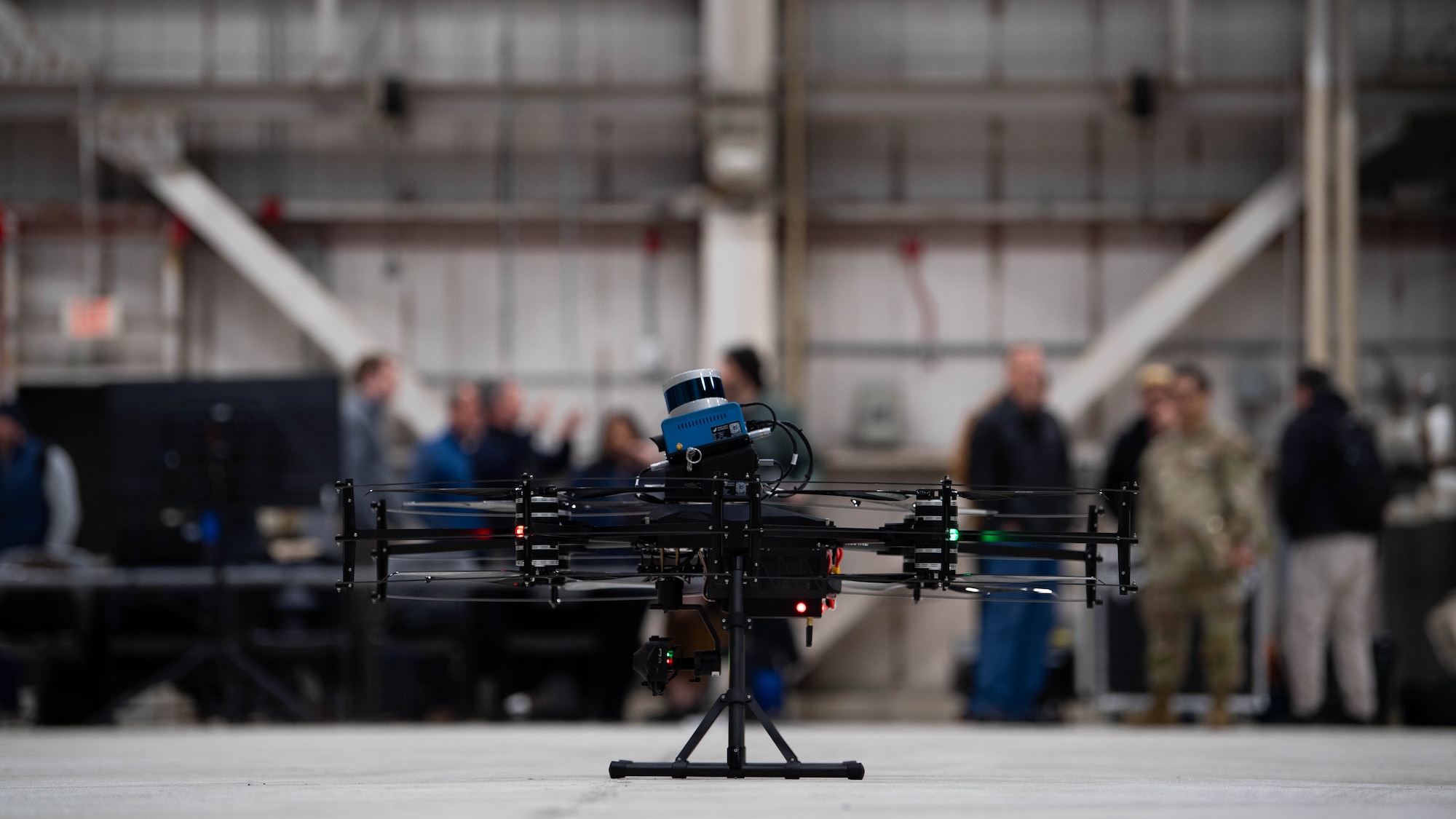 A Near Earth Autonomy drone sits before a demonstration at Dover Air Force Base, Delaware, January 23, 2024. Team Dover in cooperation with Boeing and Near Earth Autonomy tested a drone program for an autonomous C-5M Super Galaxy aircraft inspection project. Traditional inspections that require personnel to use a safety harness, maintenance stands, or vehicles can take hours to accomplish, but the drone can complete the same inspection in approximately 10 minutes. (U.S. Air Force photo by Tech. Sgt. J.D. Strong II)