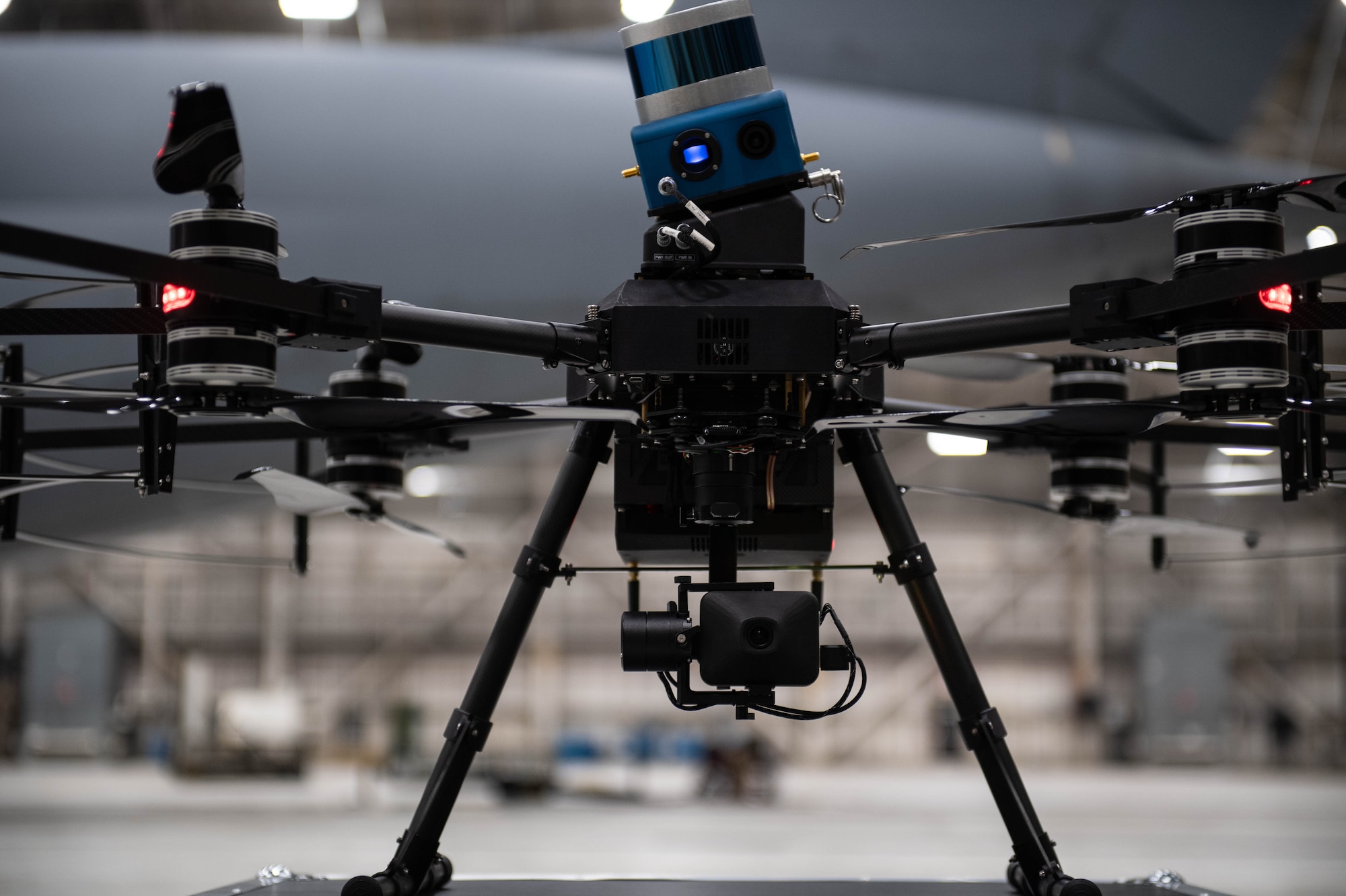 A Near Earth Autonomy drone sits on display at Dover Air Force Base, Delaware, January 23, 2024. Team Dover in cooperation with Boeing and Near Earth Autonomy tested a drone program for an autonomous C-5M Super Galaxy aircraft inspection project. Traditional inspections that require personnel to use a safety harness, maintenance stands, or vehicles can take hours to accomplish, but the drone can complete the same inspection in approximately 10 minutes. (U.S. Air Force photo by Tech. Sgt. J.D. Strong II)