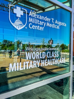 Image of Alexander T. Augusta Military Medical Center entrance with the new MTF logo and tagline, Welcome to the Home of World Class Military Healthcare.