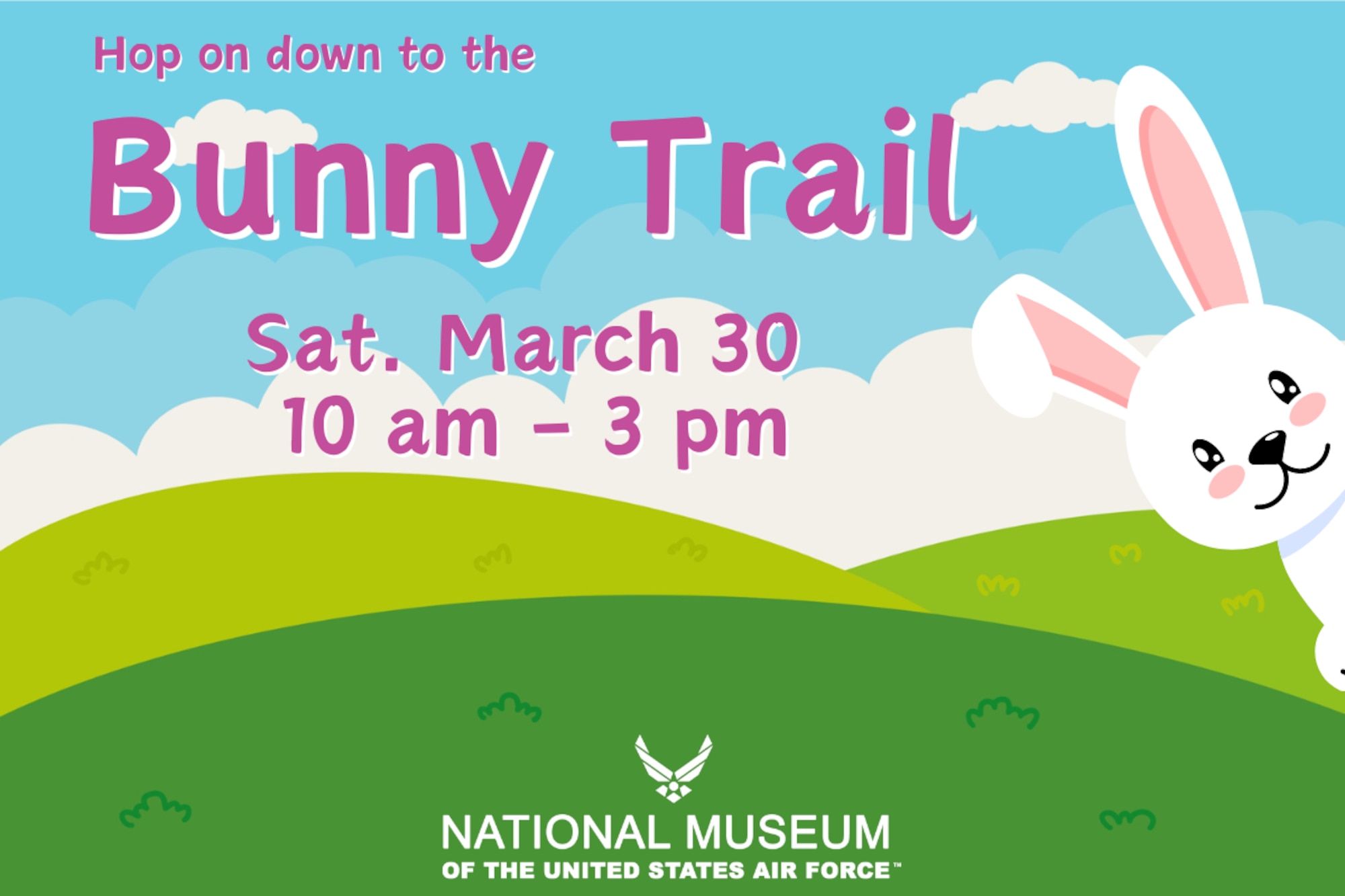 Hop on down to the Bunny Trail Saturday March 30 from 10 a.m . - 3 p.m. on top of a graphic with a blue cloudy background, green rolling hills and a cartoon bunny poking his head in from the right side.