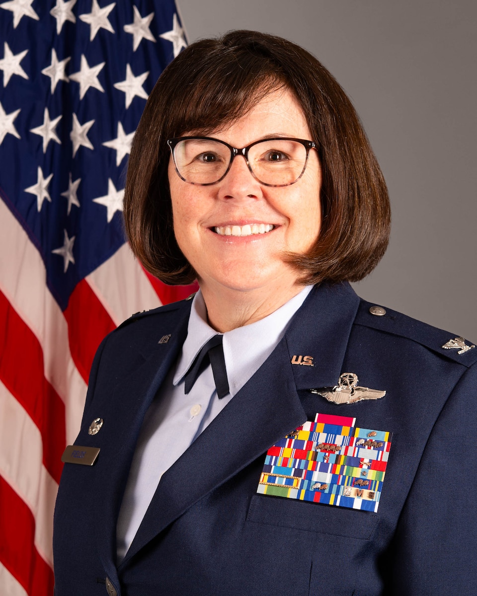 A photo of Summer Fields, dressed in an Air Force service dress uniform.