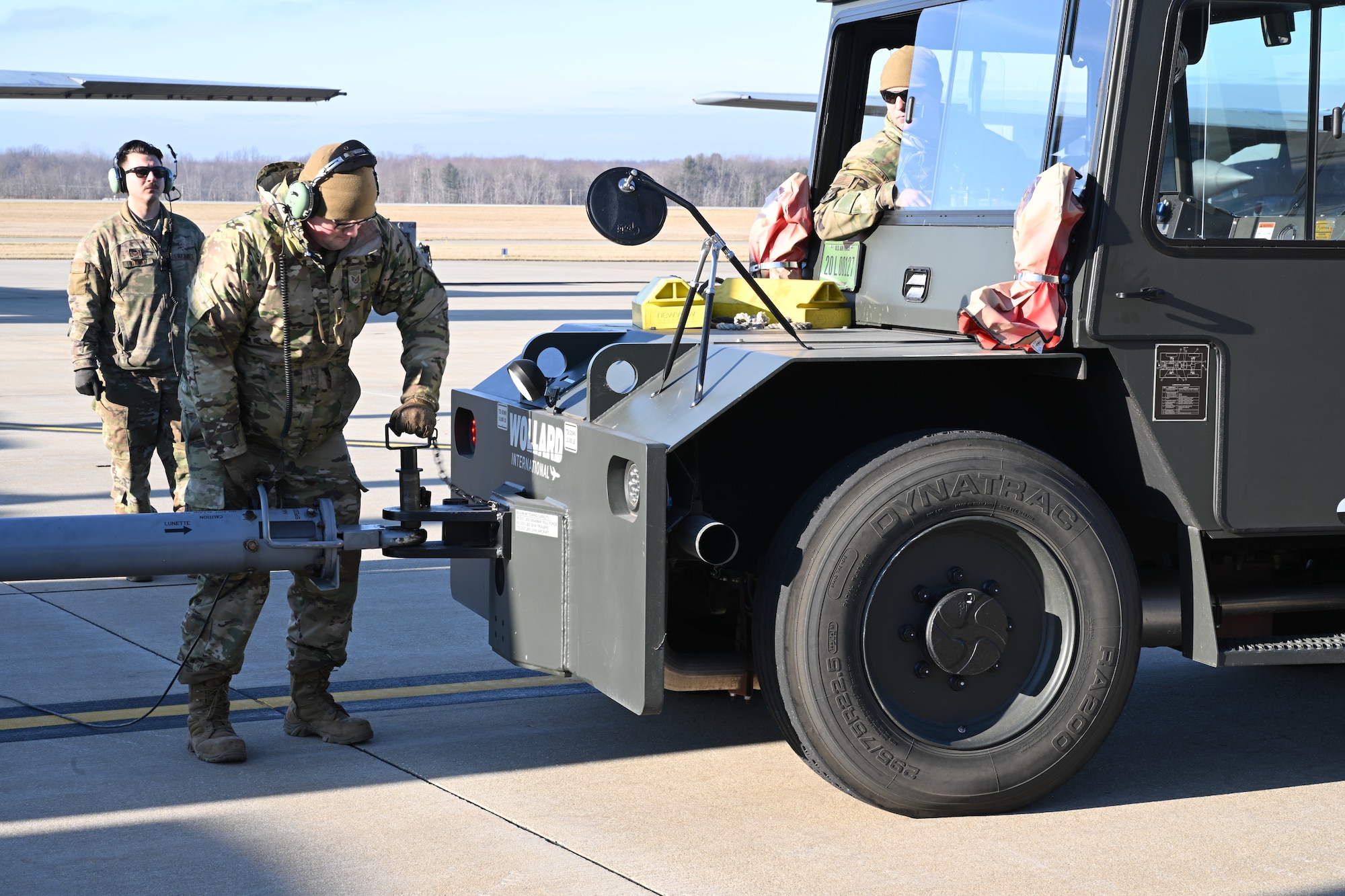 Members of the 910th Maintenance Group taxi an aircraft from a maintenance hangar to a parking spot on the aircraft ramp to begin pre-flight preparations, Jan. 31, 2024, at Youngstown Air Reserve Station, Ohio.