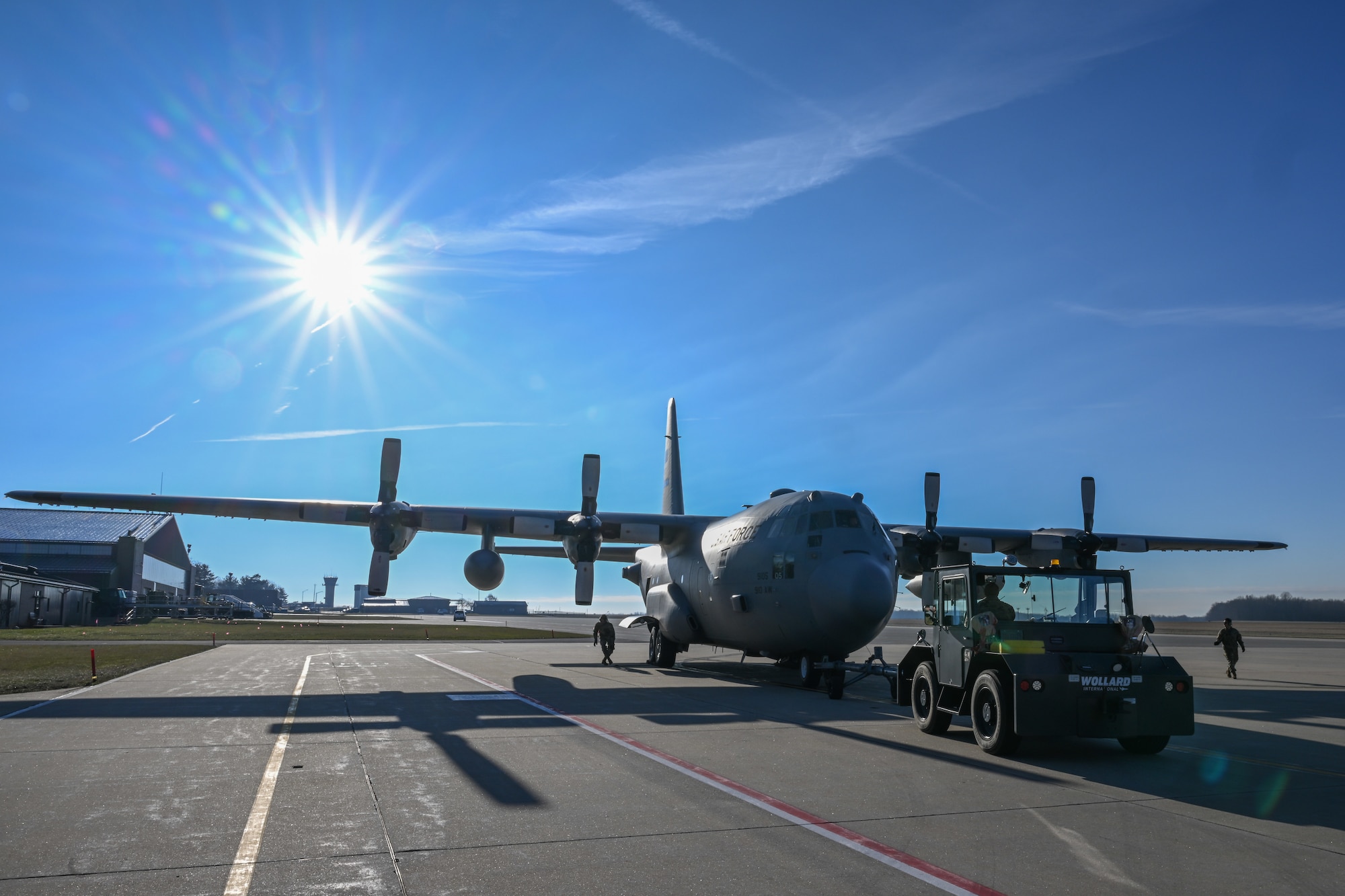 Members of the 910th Maintenance Group taxi an aircraft from a maintenance hangar to a parking spot on the aircraft ramp to begin pre-flight preparations, Jan. 31, 2024, at Youngstown Air Reserve Station, Ohio.