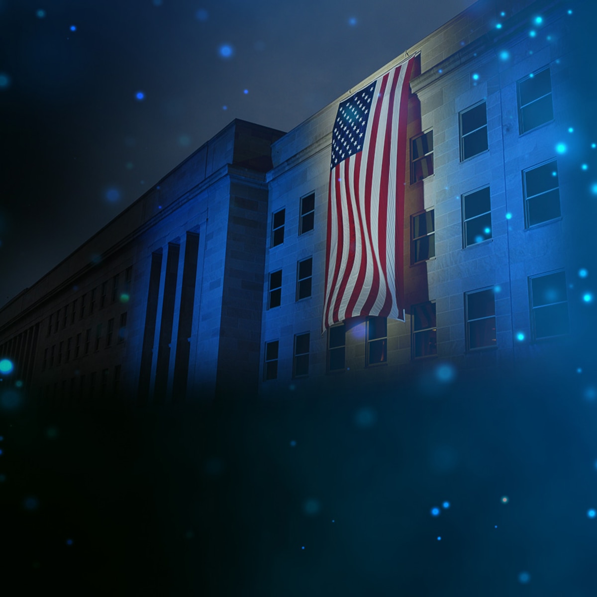 Modified illustration of Pentagon with a memorial flag illuminated near the spot where American Airlines Flight 77 crashed on 11 Sept 2001 over blue glitter stock background (image is not public domain).