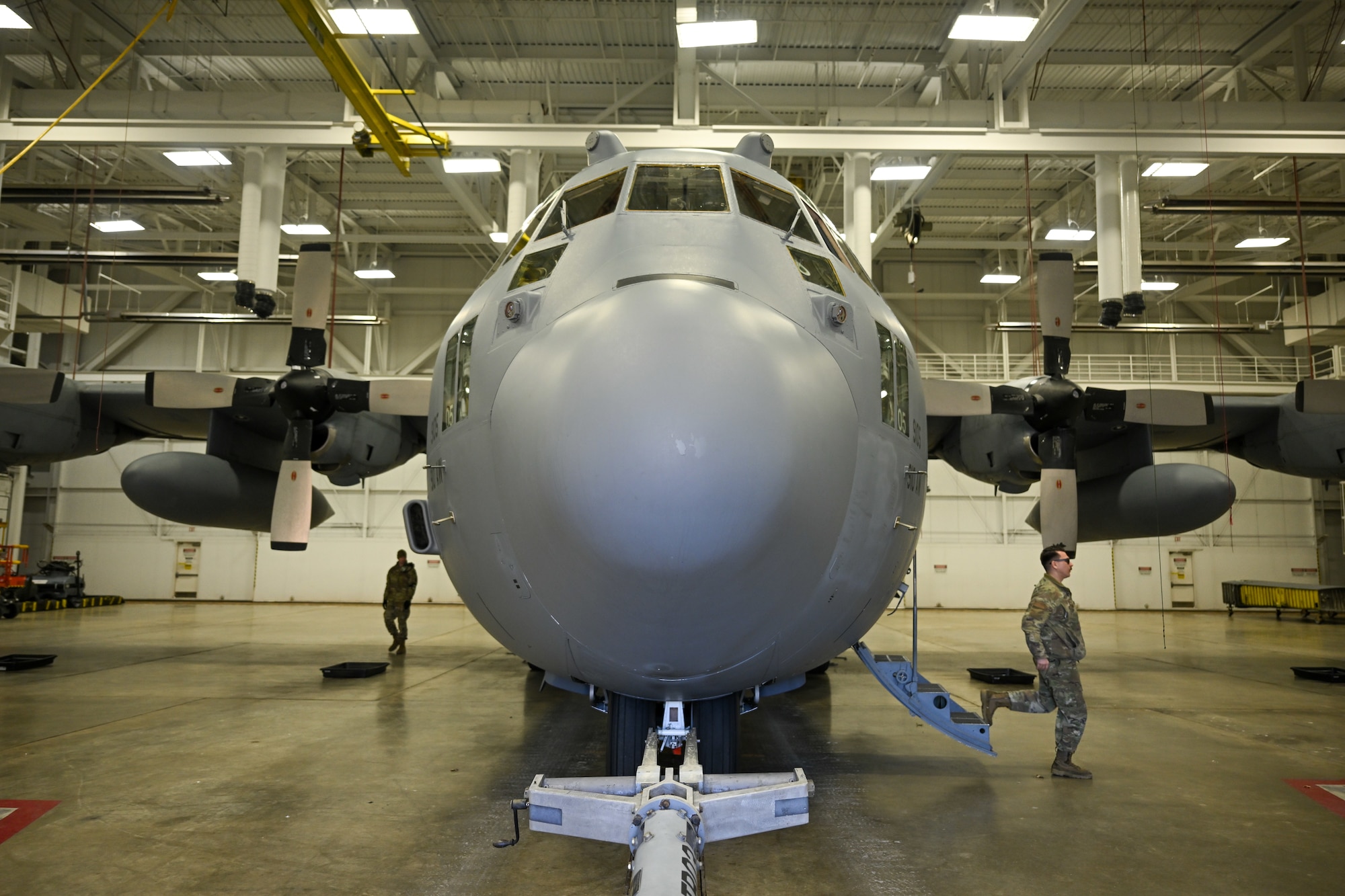 Members of the 910th Maintenance Group prepare to taxi an aircraft from a maintenance hangar to a parking spot on the aircraft ramp to begin pre-flight preparations, Jan. 31, 2024, at Youngstown Air Reserve Station, Ohio.