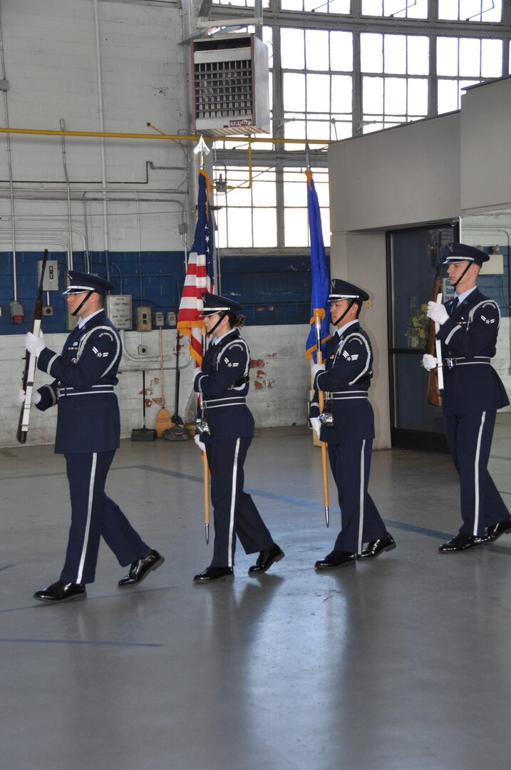 a team prepares to present the colors
