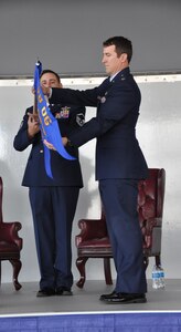 a man holds a flag