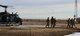 U.S. Air Force Chaplain Maj. Gen. Randall Kitchens, U.S. Air Force chief of chaplains, and U.S. Air Force Chief Master Sgt. Sadie Chambers, Religious Affairs senior enlisted advisor, exit a UH-1N Iroquois at the Missile Alert Facility Bravo-01, North Dakota, Jan. 30, 2024. As the Chief of Chaplains Board, Kitchens and his colleagues advise the secretary of Defense and the joint Chiefs of Staff on religious, ethical and quality-of-life concerns. (U.S. Air Force photo by Airman 1st Class Luis Gomez)