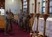 U.S. Air Force Chaplain Maj. Gen. Randall Kitchens, U.S. Air Force chief of chaplains, (center) and U.S. Air Force Chief Master Sgt. Sadie Chambers, Religious Affairs senior enlisted advisor, (right) receives a tour of the Northern Lights Chapel at Minot Air Force Base, North Dakota, Jan. 29, 2024. As the Chief of Chaplains, Kitchens leads the Department of the Air Force Chaplain Corps of approximately 2,100 chaplains and religious affairs Airmen from the active duty and Air Reserve components. (U.S. Air Force photo by Airman 1st Class Luis Gomez)