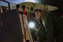 U.S. Air Force Chaplain Maj. Gen. Randall Kitchens, U.S. Air Force chief of chaplains, (center) and U.S. Air Force Capt. John Cavassa, 69th Bomb Squadron command support staff, prepare to go inside a B-52H Stratofortress at Minot Air Force Base, North Dakota, Jan. 29, 2024. As a member of the special staff of the Chief of Staff of the Air Force and Chief of Space Operations, Kitchens establishes guidance and provides advice on all matters pertaining to the religious and moral welfare of Air and Space Force personnel and is responsible for establishing effective programs to meet the religious needs of Airmen, Guardians and their dependents. (U.S. Air Force photo by Airman 1st Class Luis Gomez)