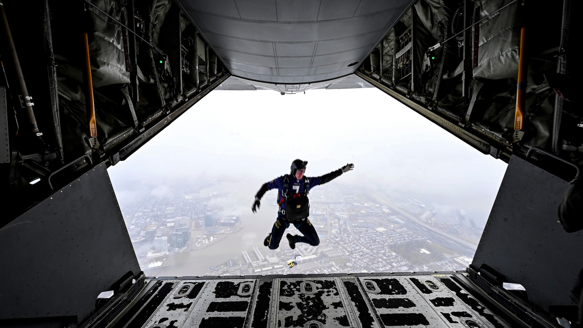 Man jumps out of a plane.