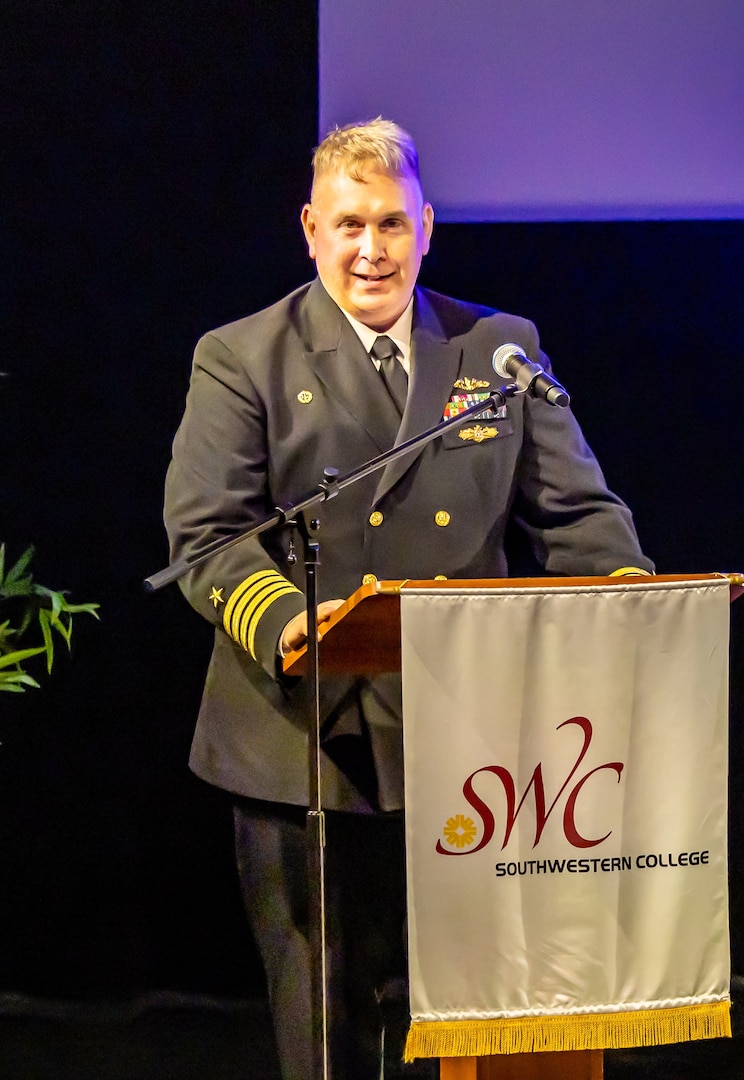 Capt. Michael Oberdorf, commander, Portsmouth Naval Shipyard, addresses members of the Class of 2024. Jan. 18, 2023, during a graduation ceremony at Southwestern College, in Chula Vista, Calif., in honor of their successful completion of the Southwest Regional Apprentice Program. (U.S. Navy photo by Jeb Fach)