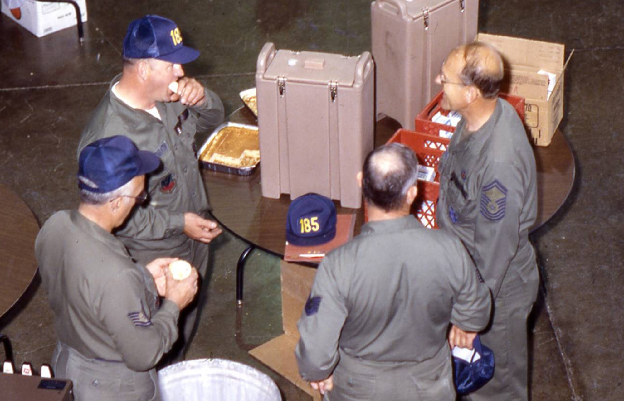 Airmen eating doughnuts
