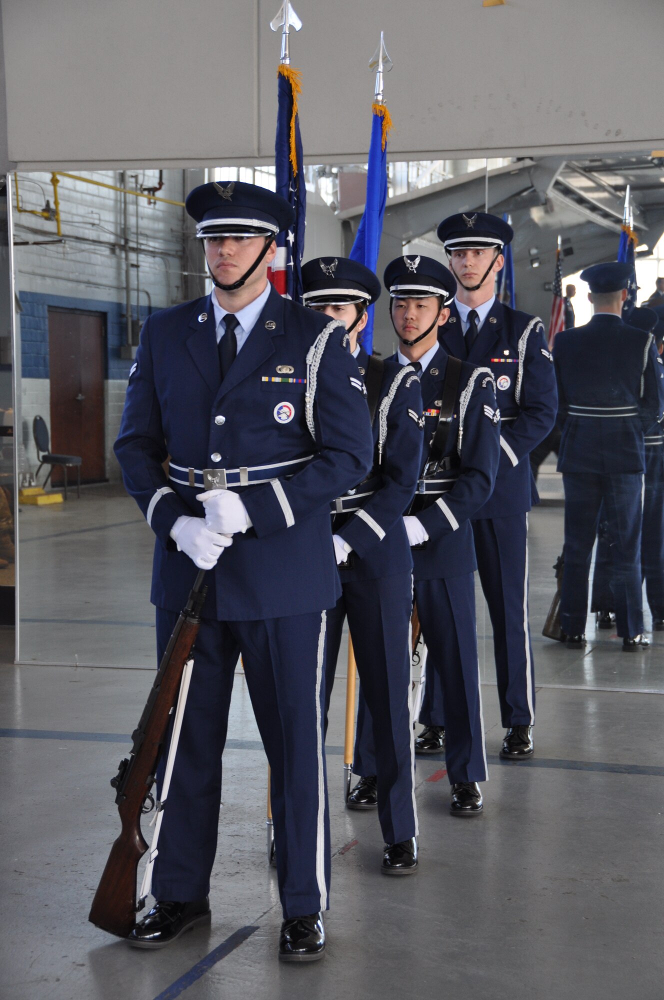 a team prepares to present the colors