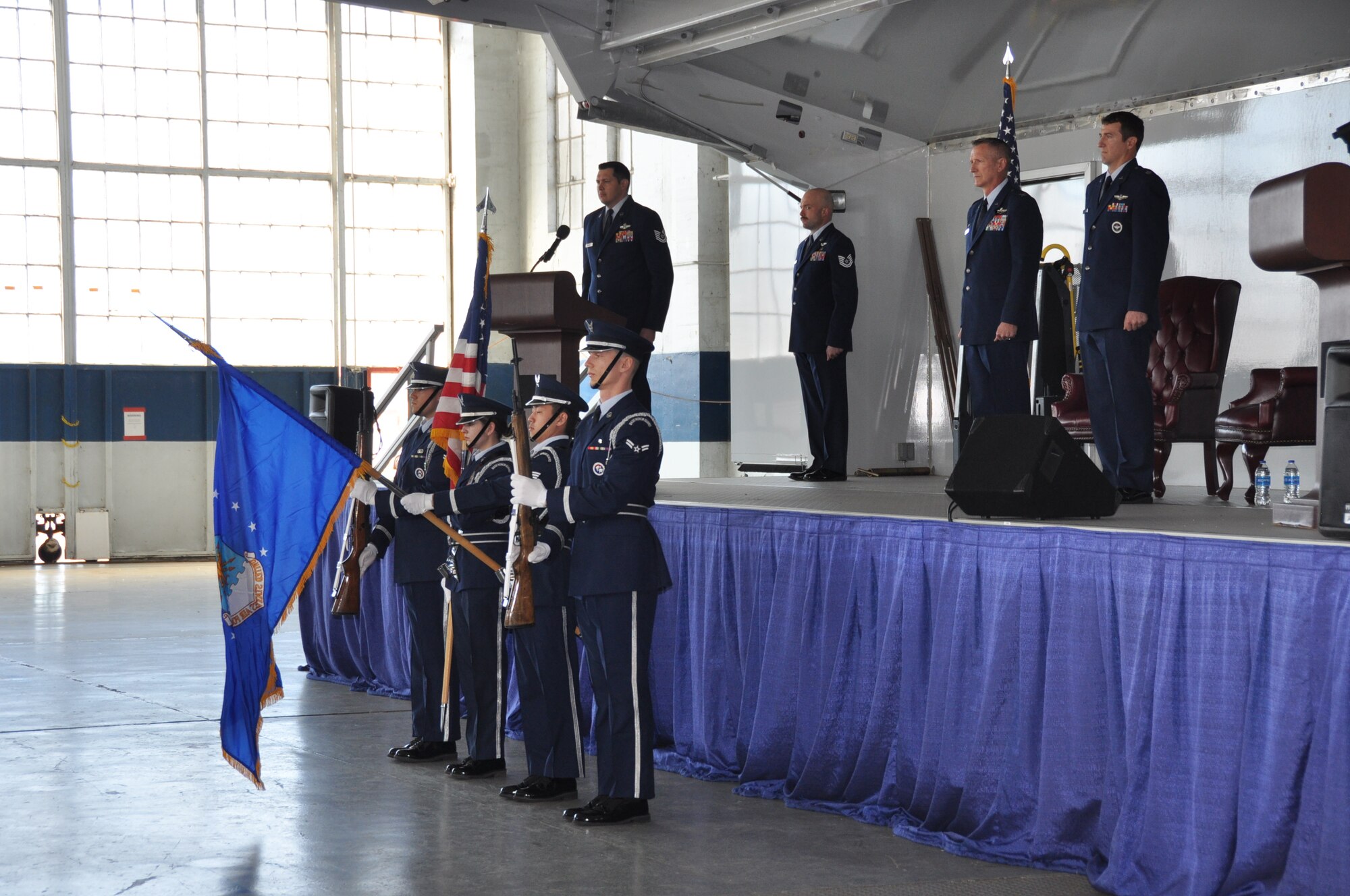 a team presents the colors