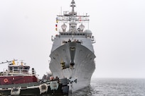 The guided-missile cruiser USS Leyte Gulf (CG 55) departs Naval Station Norfolk, Jan. 28, 2024, for a scheduled deployment to the U.S. 4th Fleet area of operations.