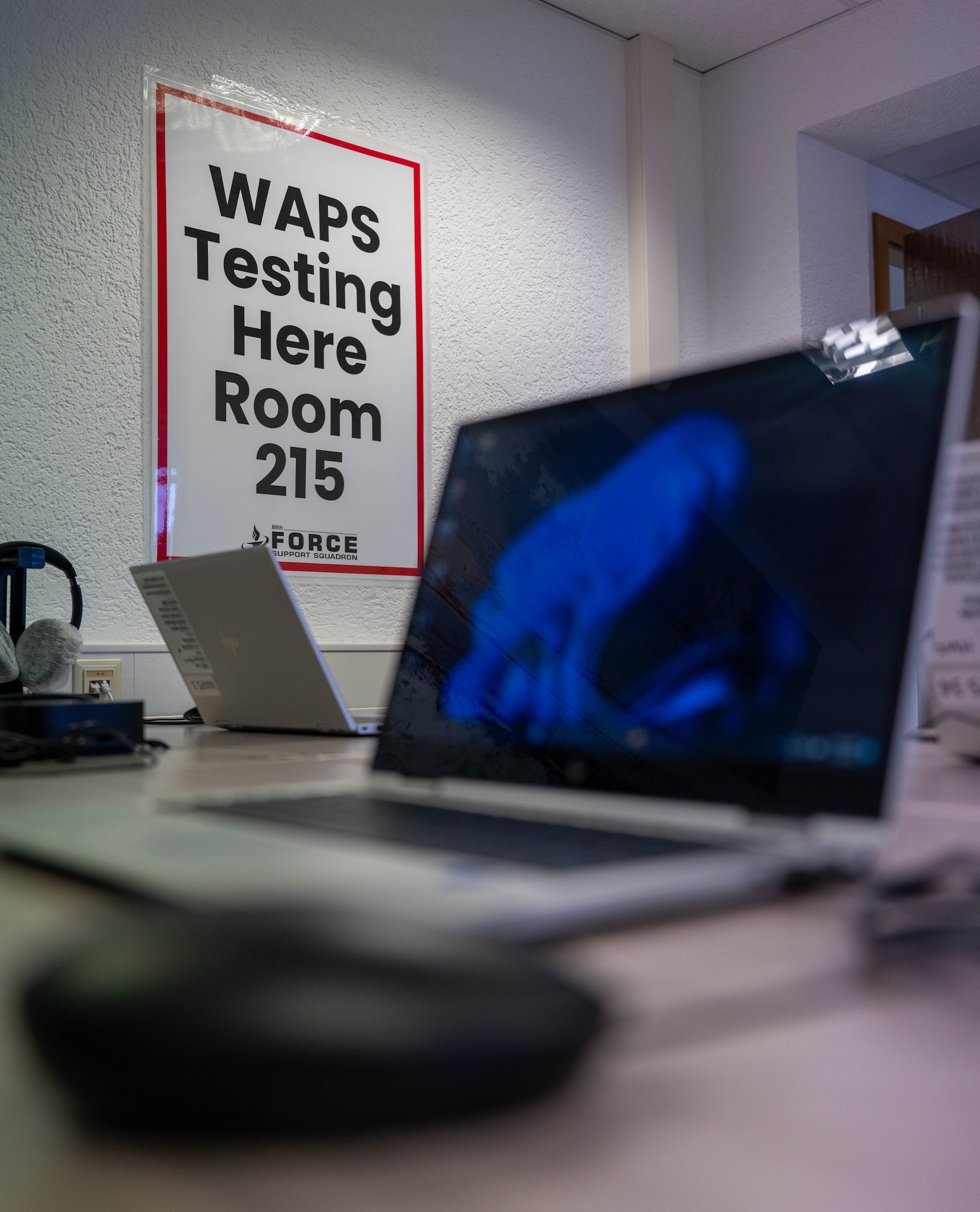 A computer rests on a table