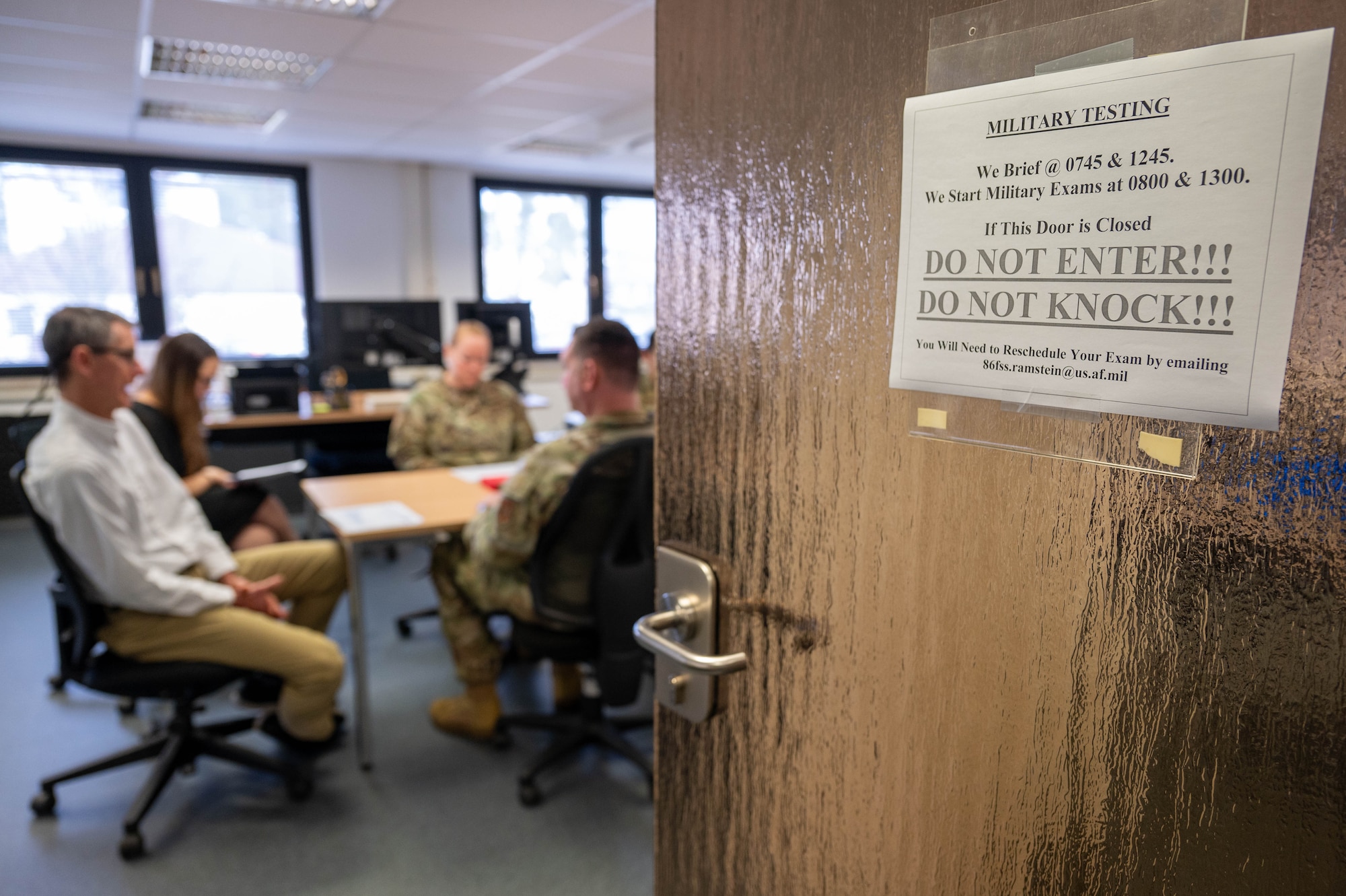 Test control officers brief Ramstein leadership on the Electronic Weighted Airman Promotion System