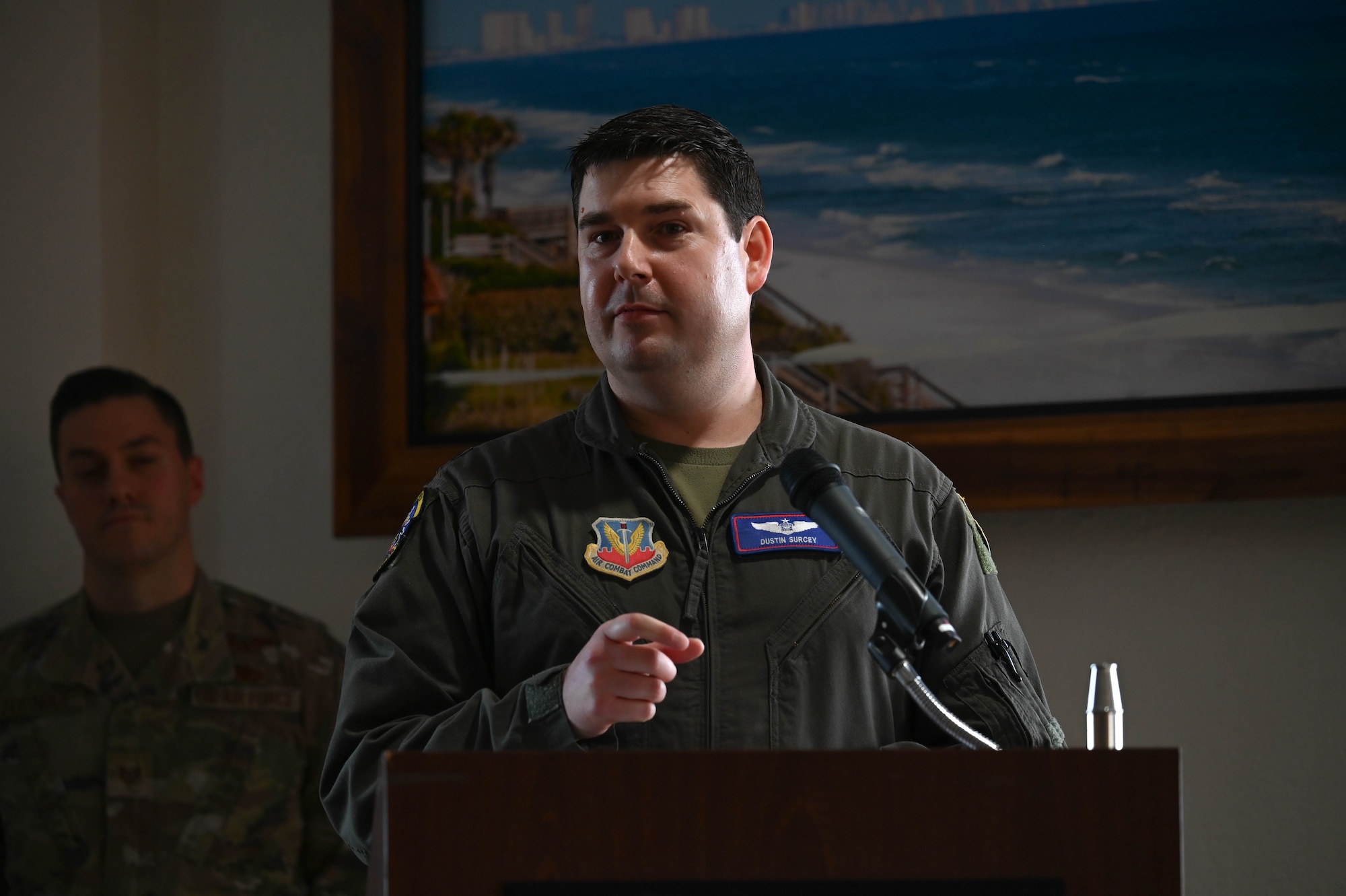 U.S. Air Force Lt. Col. Dustin Surcey, 39th Electronic Warfare Squadron commander, gives remarks after taking command of the 39th EWS at his change of command at Eglin Air Force Base, Fla., Jan. 19, 2024. The 39th EWS provides combat relevant electronic warfare capabilities in support of 9 combatant commands and over 70 electronic warfare systems. (U.S. Air Force photo by Capt. Benjamin Aronson)