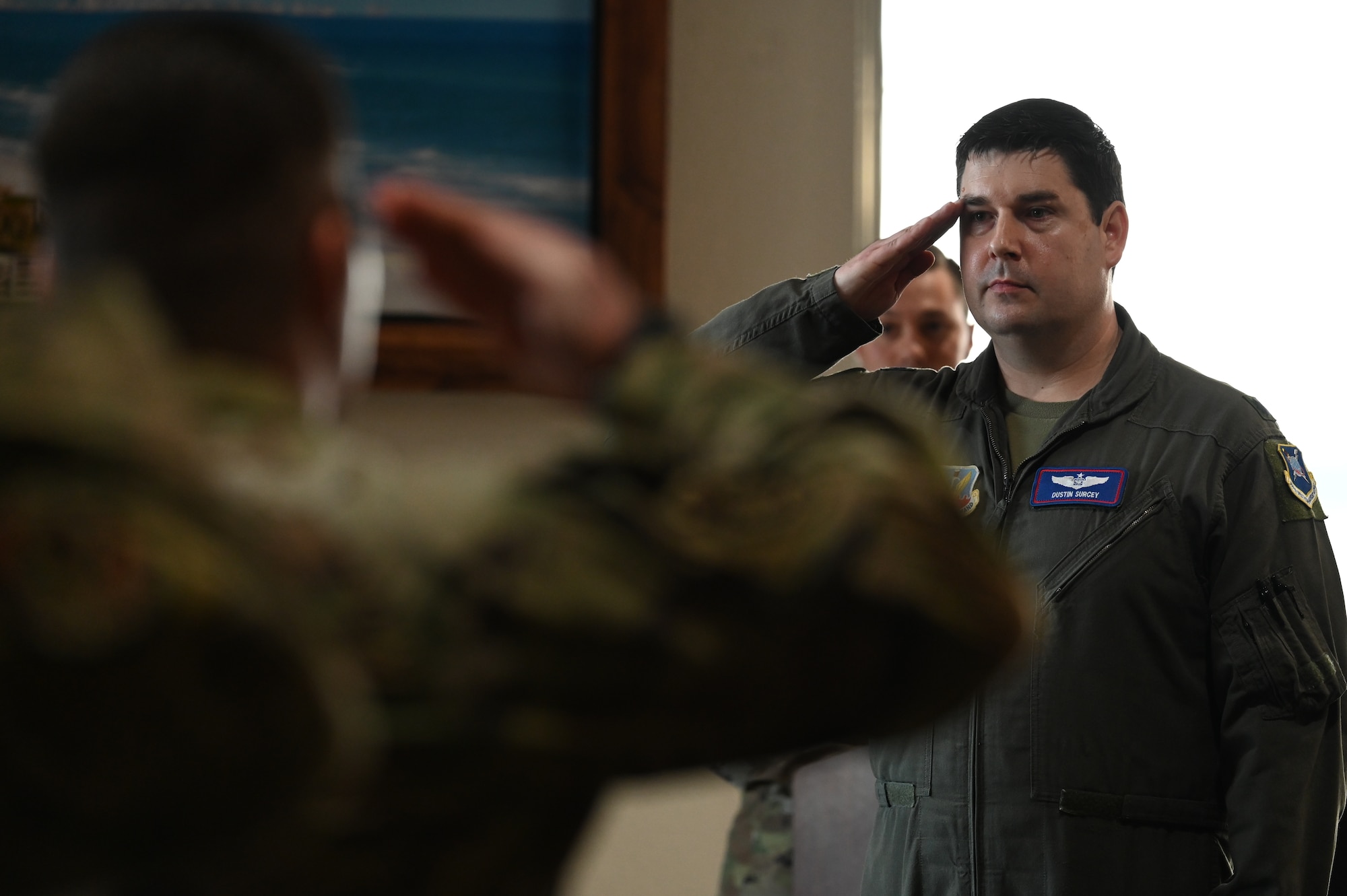 U.S. Air Force Lt. Col. Dustin Surcey, 39th Electronic Warfare Squadron commander, renders his first salute to the 39th EWS during his change of command ceremony at Eglin Air Force Base, Fla., Jan. 19, 2024. The 39th EWS was activated in 2020 ahead of the standup of the 350th Spectrum Warfare Wing, which was activated in 2021. (U.S. Air Force photo by Capt. Benjamin Aronson)