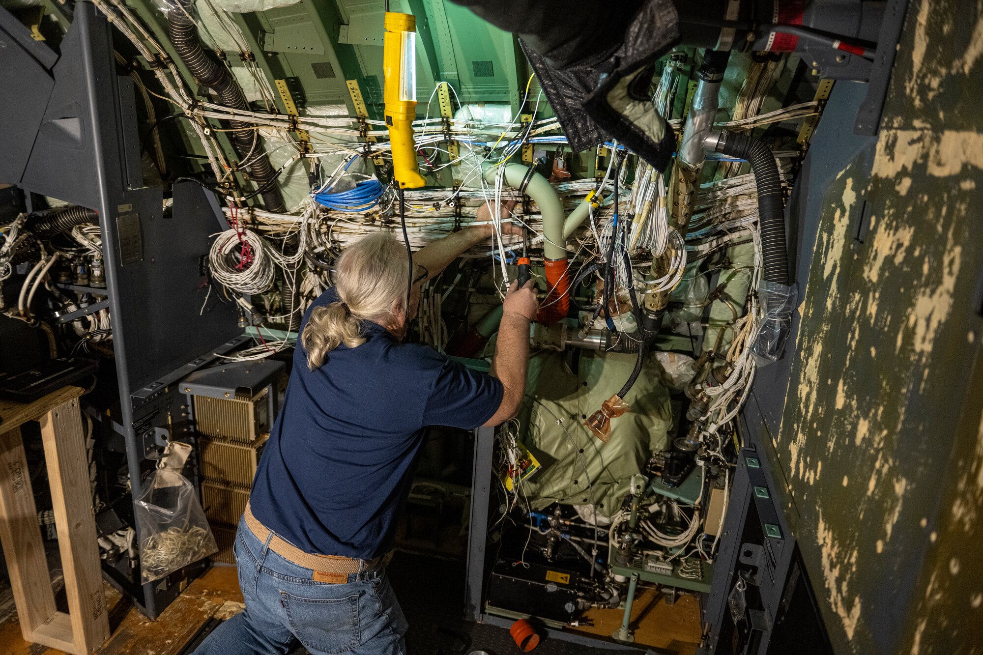 Richard Bannister, Lockheed Martin structures mechanic, reworks an avionics cooling duct