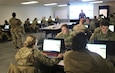 Students with the Fort McCoy Noncommissioned Officer Academy Basic Leader Course learn about land navigation Jan. 29, 2024, at the Fort McCoy, Wis., Virtual Battle Space simulations facility. The students spent a day training at the facility as part of course instruction. The training is called Virtual Battle Space for Map Reading and Land Navigation and is one of the newest additions to the course. (U.S. Army Photo by Scott T. Sturkol, Public Affairs Office, Fort McCoy, Wis.)