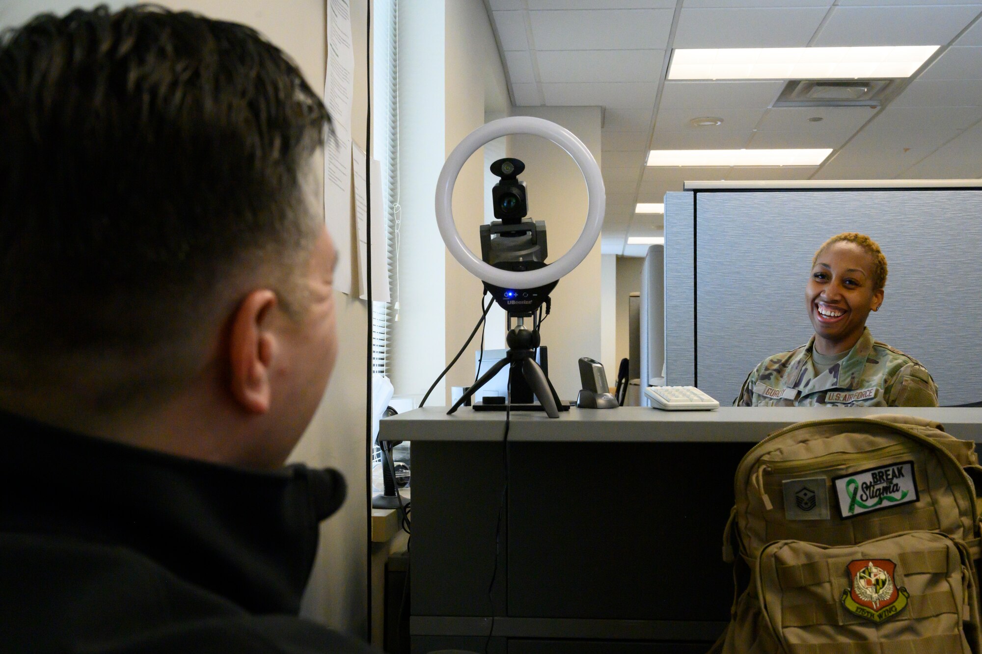 U.S. Air Force Senior Airman Rose Gurley, a personnel specialist assigned to 175th Force Support Squadron, Maryland Air National Guard, helps Timothy Dash, a retired master sergeant, process his retirement paper work at 175th Wing headquarters, Martin State Air National Guard Base, Maryland, Jan. 22, 2024.