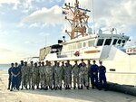 U.S. Coast Guard Cutter Isaac Mayo crew members host members of the Cayman Islands Coast Guard in Georgetown, Cayman Islands, Jan. 9, 2024. The crew met with maritime security stakeholders to further a successful partnership with the U.S. Coast Guard. (U.S. Coast Guard courtesy photo)