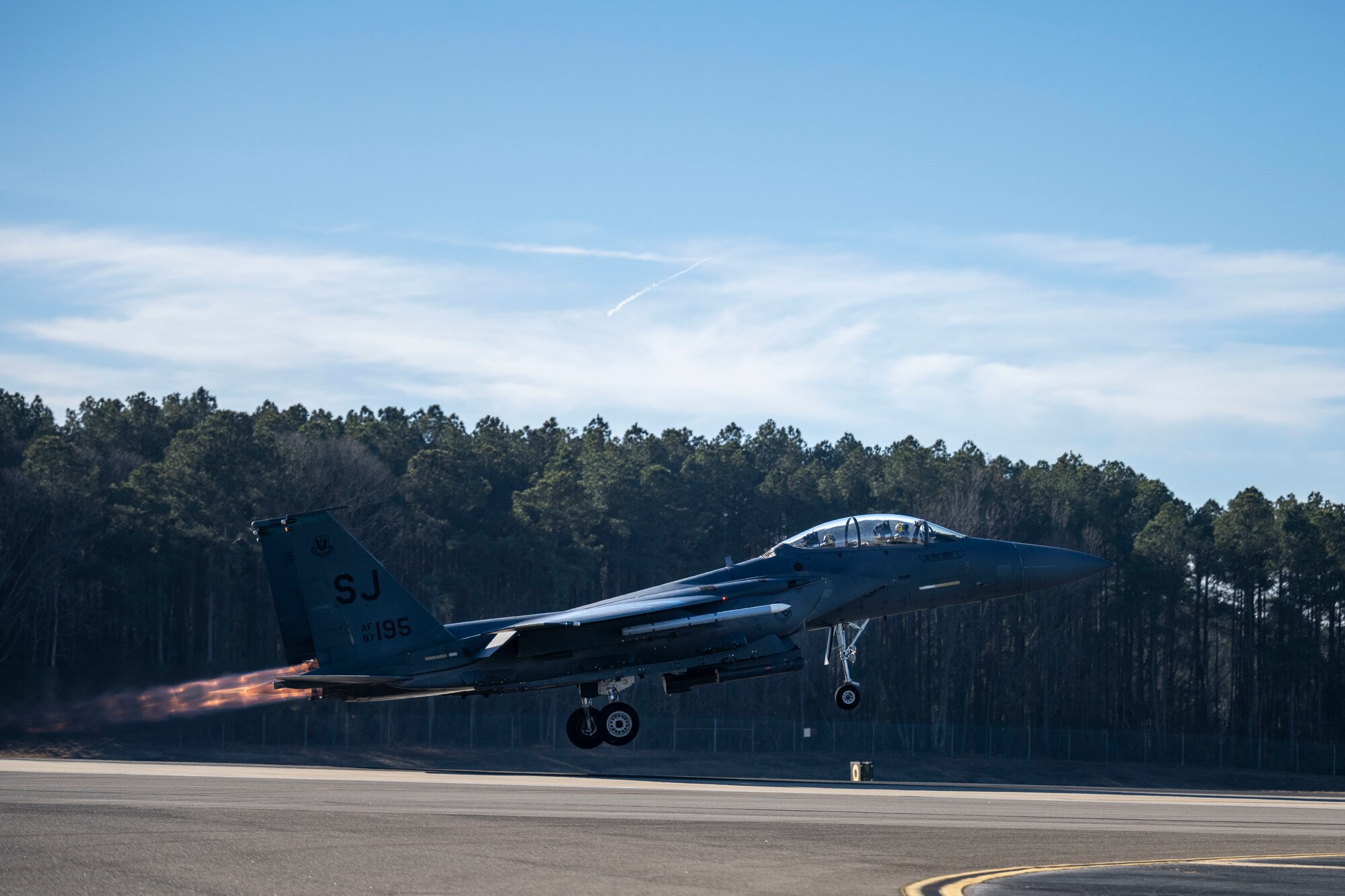 A U.S. Air Force crew chief assigned to the 4th Fighter Wing, performs an inspection on an F-15E Strike Eagle at Seymour Johnson Air Force Base, North Carolina, Jan. 22, 2024. Crew chiefs specialize in detailed inspections, diagnosing malfunctions and record-keeping. (U.S. Air Force photo by Senior Airman Sabrina Fuller-Judd)