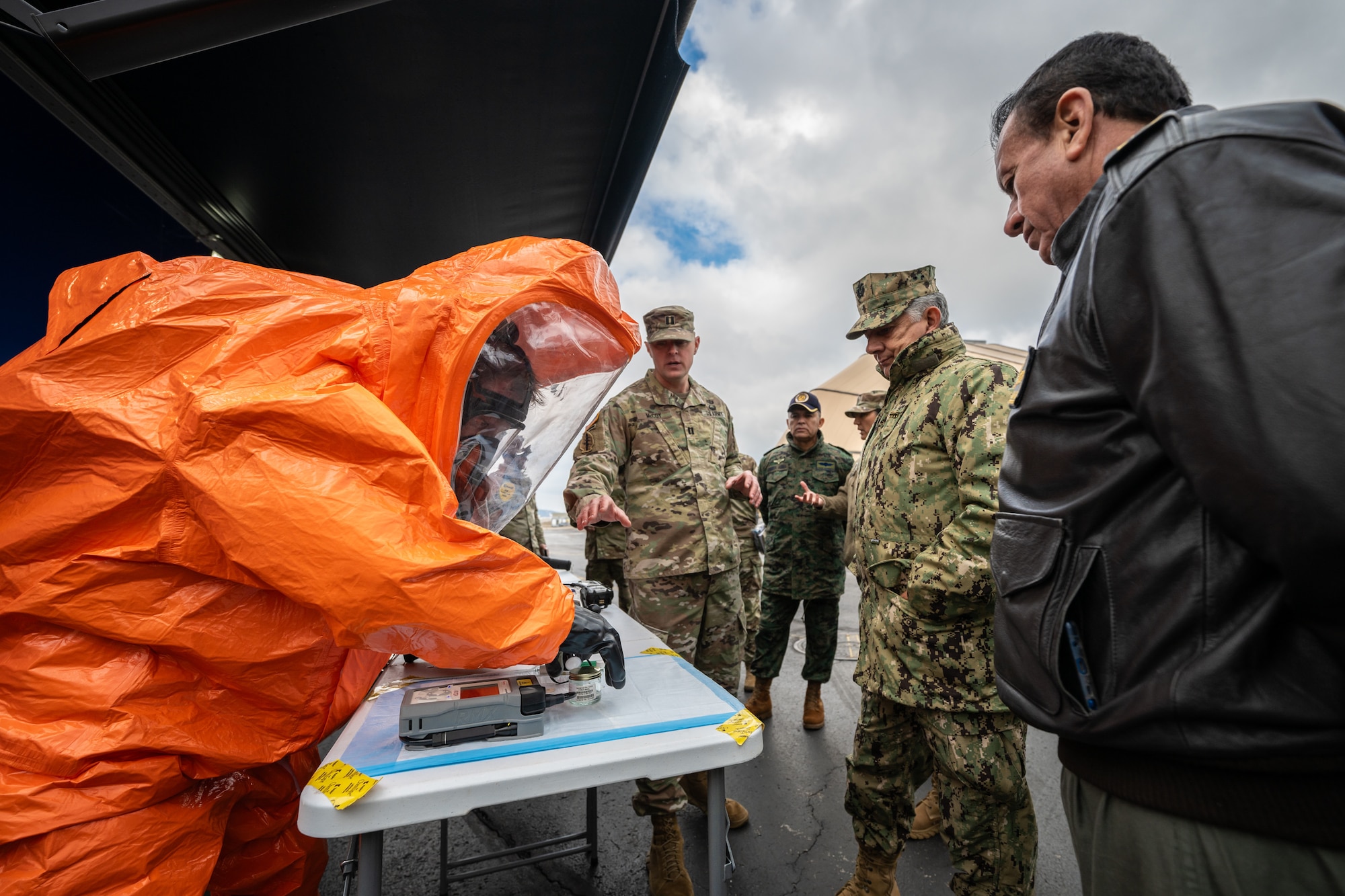 A U.S. Army Soldier assigned to the Kentucky National Guard’s 41st Civil Support Team – Weapons of Mass Destruction, identifies a potentially hazardous chemical using Raman spectroscopy as part of a demonstration for Ecuadorian military leaders at the Kentucky Air National Guard Base in Louisville, Ky., Jan. 31, 2024. The Ecuadorians are visiting this week to exchange information with the Kentucky National Guard as part of the State Partnership Program, a National Guard Bureau effort that pairs Guard units with foreign allies to foster enhanced understanding across all aspects of civil and military affairs. (U.S. Air National Guard photo by Dale Greer)