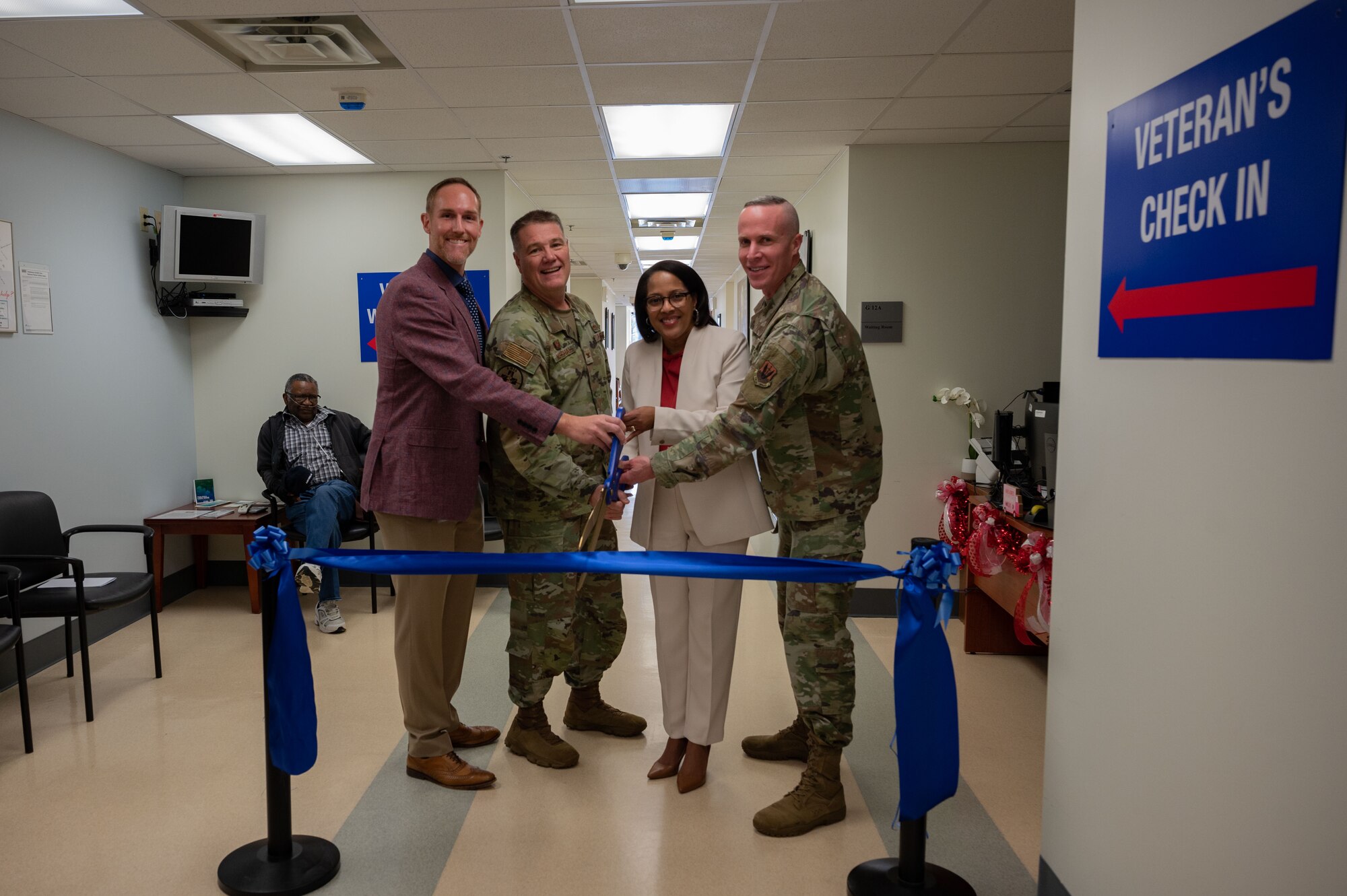 Dr. John McDaniel, Veterans Affairs Dental Chief, left, U.S. Air Force Col. Sean Marshall, 4th Medical Group commander, middle left, Marri Fryer, Veterans Affairs Coastal HealthCare System Executive Director, middle right, Lt. Col. Nicholas Einbender, Chief of dental services, right, pose for a photo during a ribbon cutting ceremony for the VA Dental clinic at Seymour Johnson Air Force Base, North Carolina, Jan. 19, 2024. This clinic represents the inaugural collaboration at the 4th Fighter Wing dental clinic, where VA dental workers will partner with Kiecker Dental Clinic Airmen to provide services for both active duty personnel and veterans with base access. (U.S. Air Force photo by Airman 1st Class Rebecca Sirimarco-Lang)