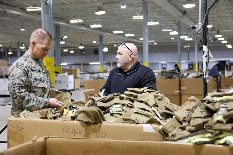 Maj. Gen. Keith D. Reventlow, commanding general, Marine Corps Logistics Command receives a tour of the CL II Support Division (CIISD) warehouse in Albany Ga. from Robert A. Wilson, Director, CIISD, 30 Jan. 2024. The CIISD provides tailored logistics and sustainment support to Marine Corps and Joint customers in support of Chemical, Biological, Radiological, and Nuclear Defense, Expeditionary Fire Support equipment and other Class II material.