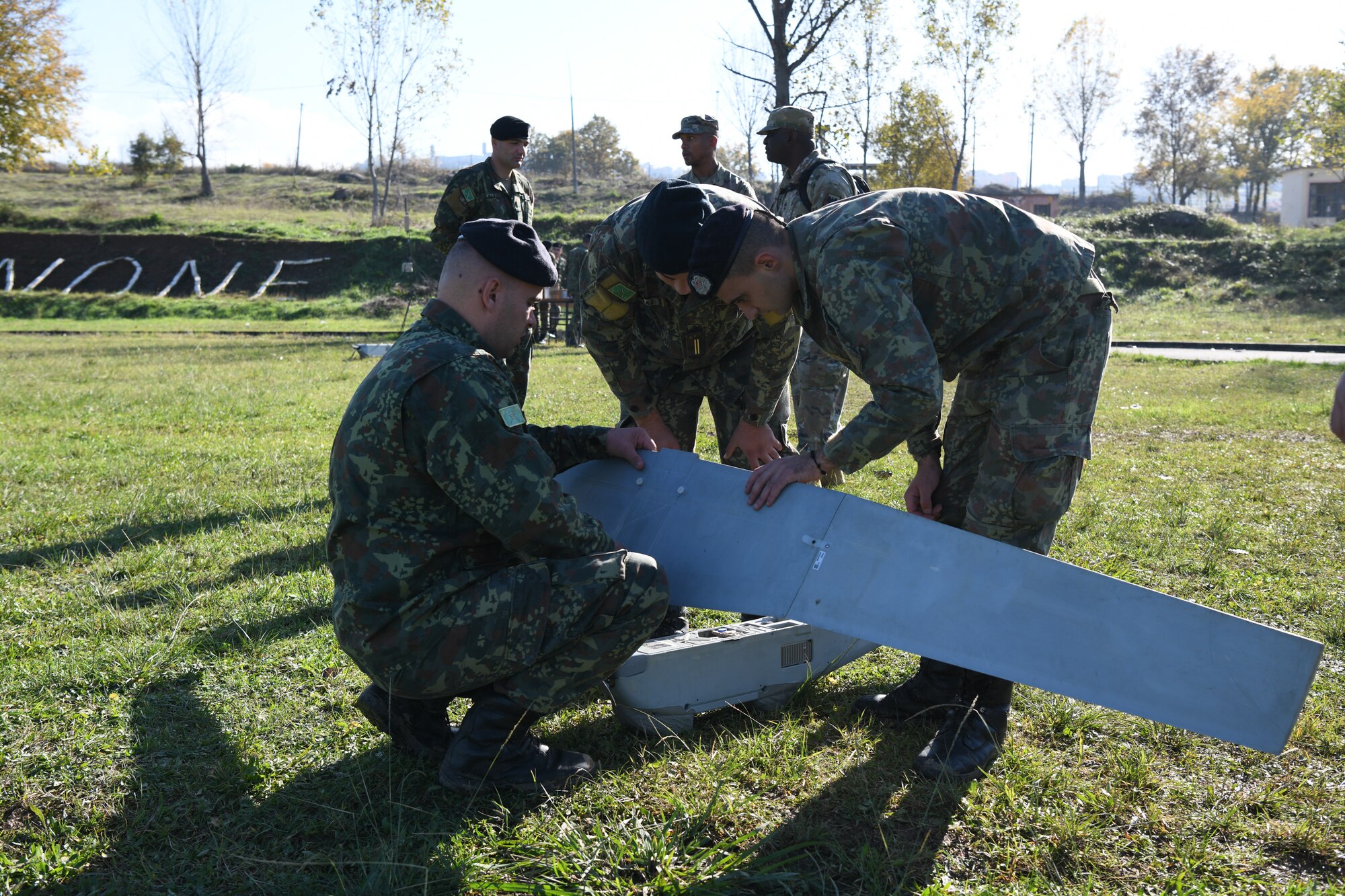 Albanian Armed Forces members conducting setup procedures of the Puma AE3 DDL drone.