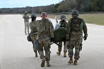 Operation AGILE Medic, a week-long exercise at Joint Base San Antonio-Camp Bullis, Texas, was a Tri-Service medical training exercise that immersed military medics in the seamless process of transporting patients from the Expeditionary Medical Support unit to the En Route Patient Staging System team, and further to Air Evacuation and Critical Care Air Transport Teams, and vice versa.