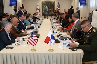 Senior Panamanian and U.S. security leaders sit at a long table.