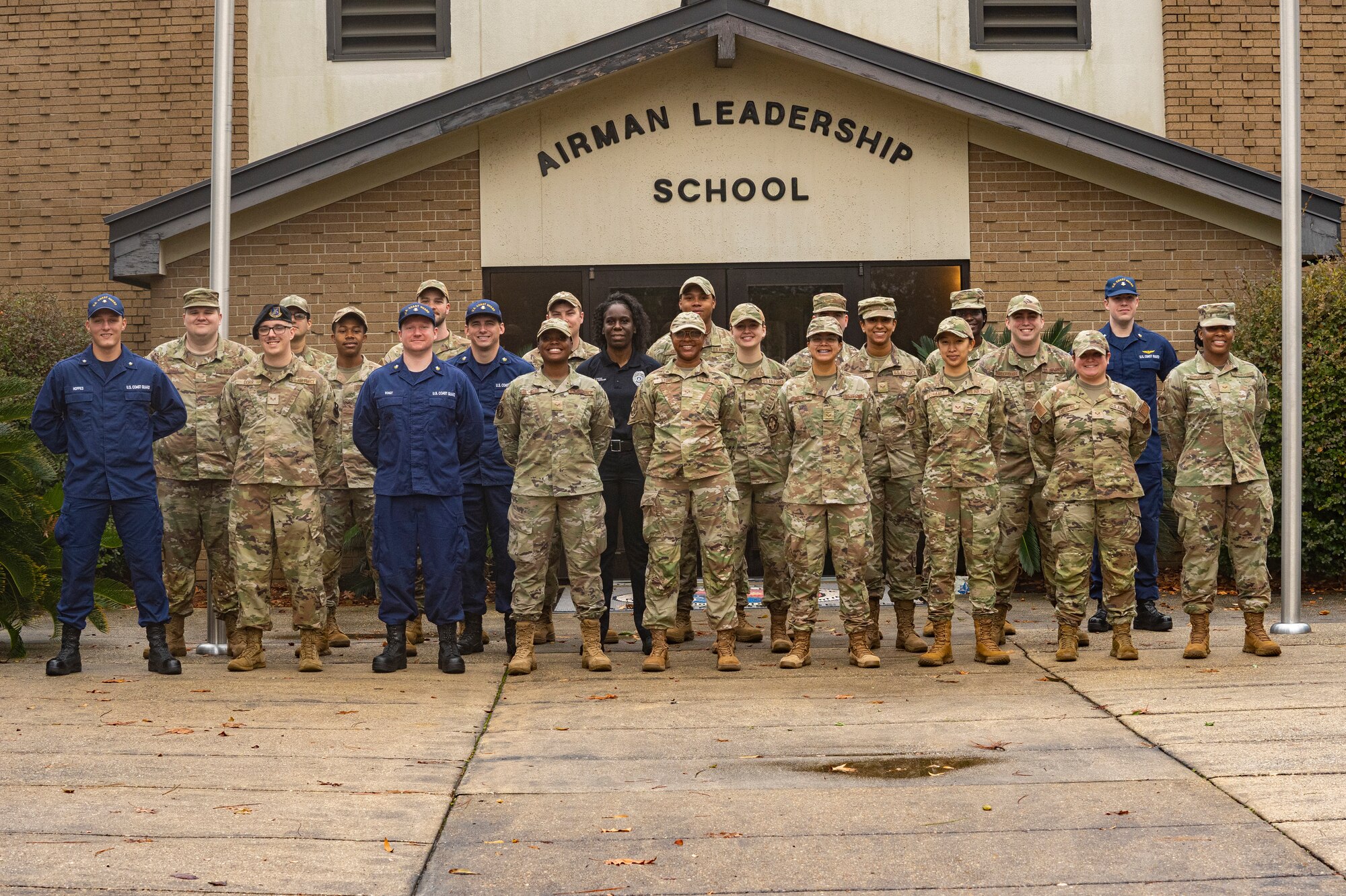 Students from Airman Leadership School Class 24-2 pose for a group photo at Keesler Air Force Base, Mississippi, Jan. 24, 2024.