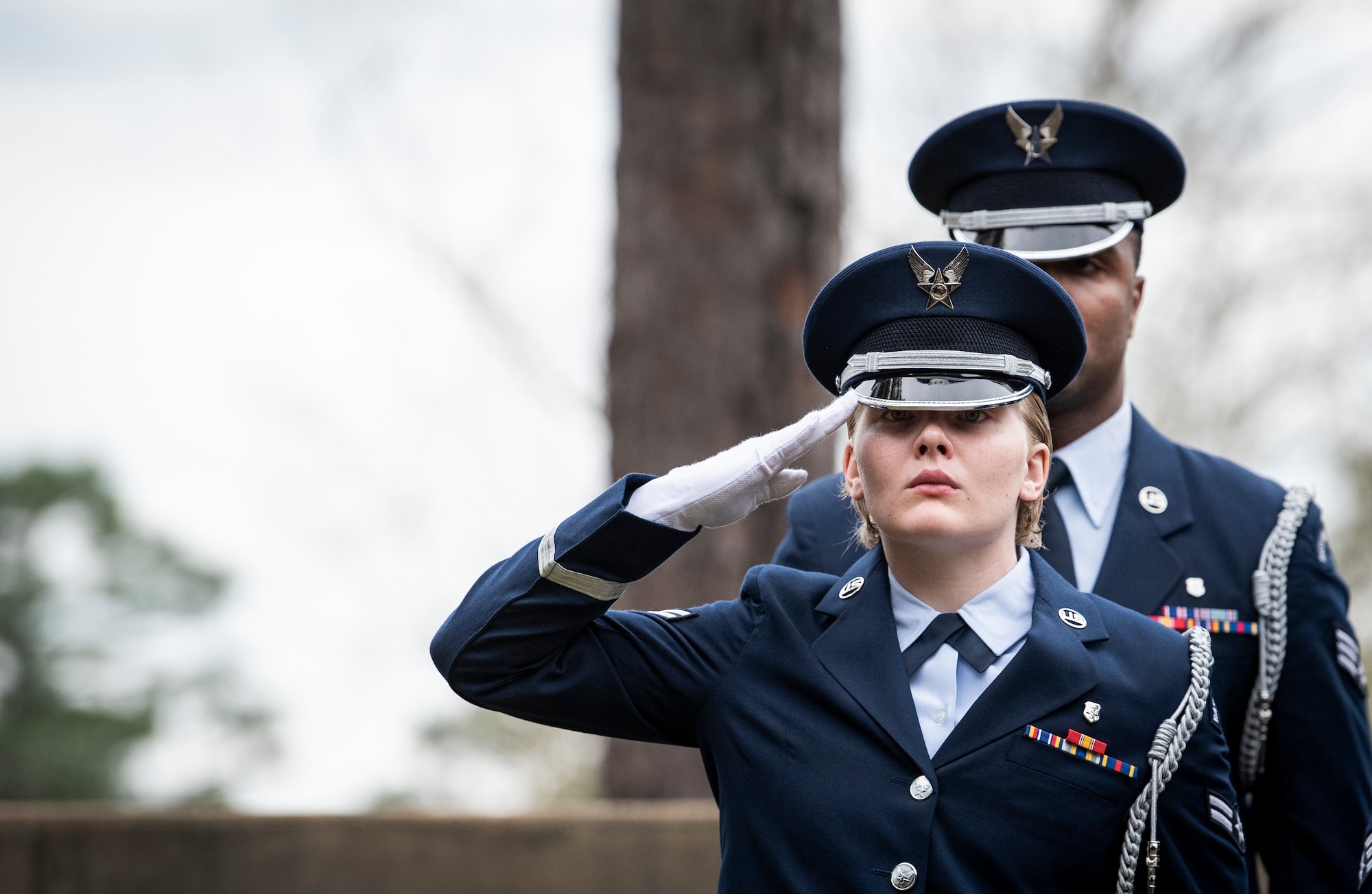 Female soldier saluring